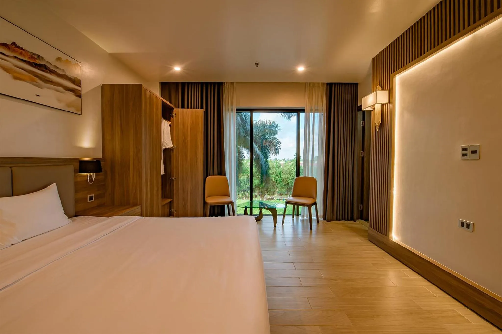 Bed in ZEN RIVERSIDE HOTEL & RESIDENCES