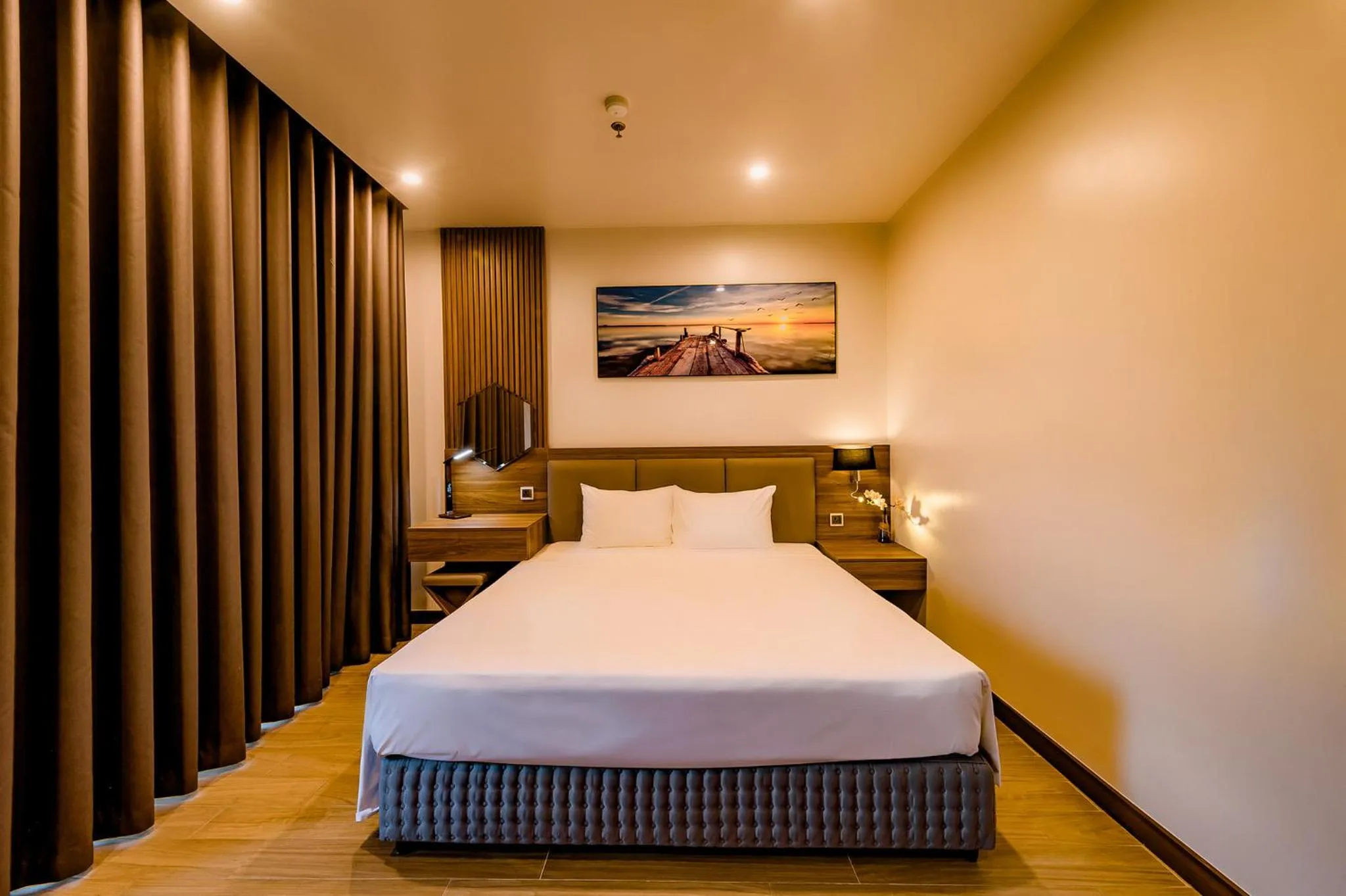 Bed in ZEN RIVERSIDE HOTEL & RESIDENCES