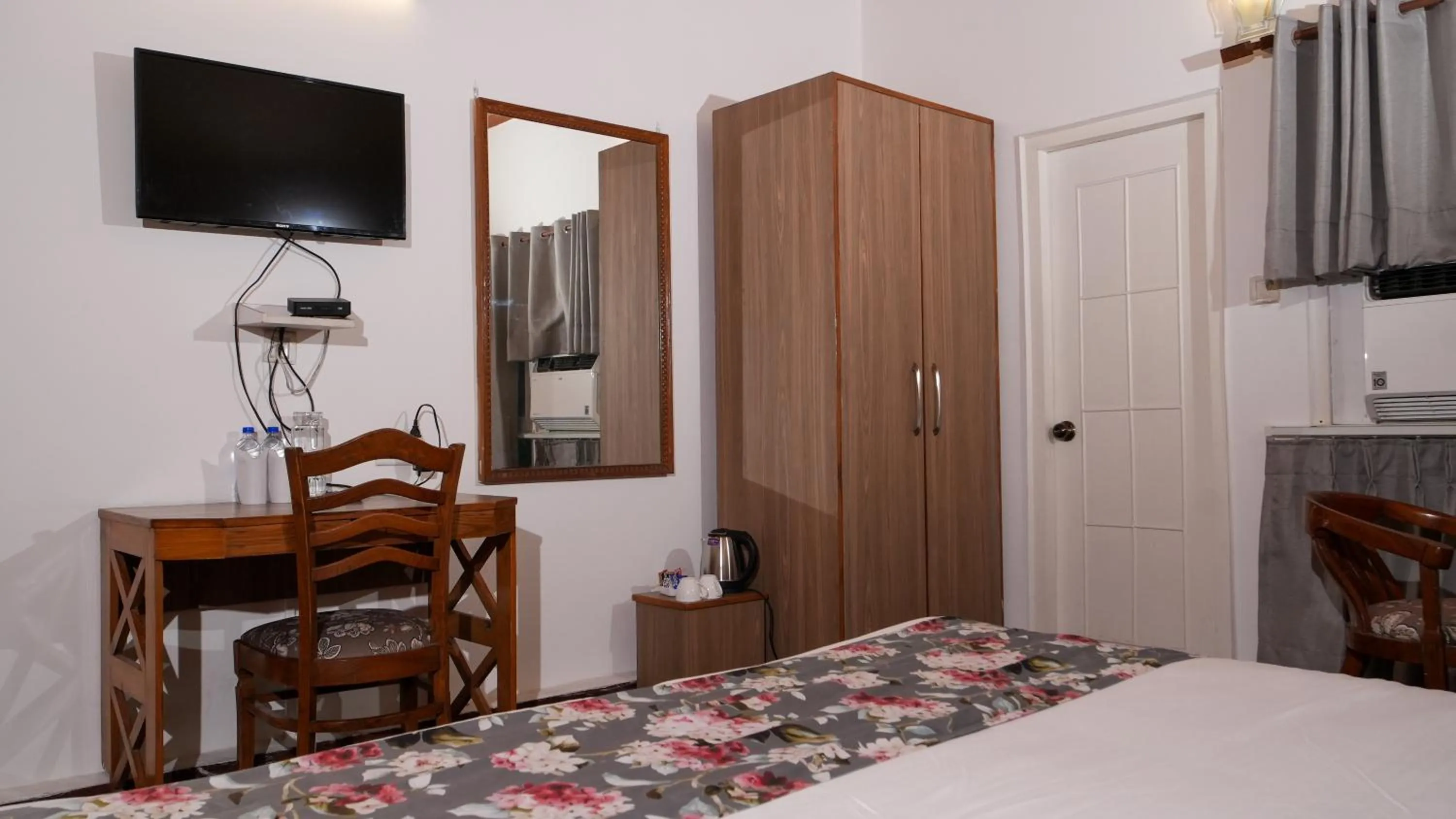 Bed in Neelesh Inn- A Luxury Lake View Hotel- 20 kms from Nainital