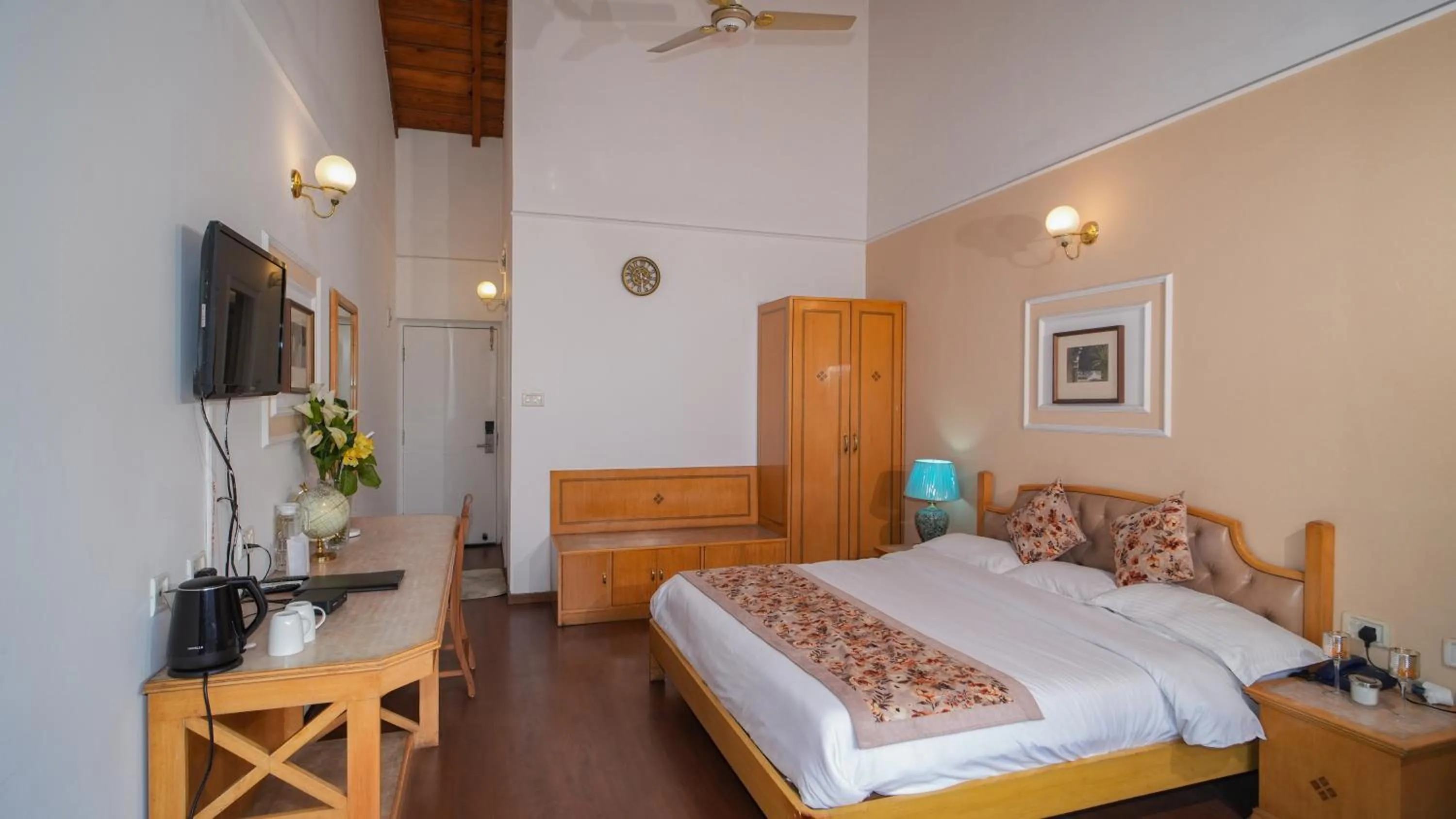 Photo of the whole room, Bed in Neelesh Inn- A Luxury Lake View Hotel- 20 kms from Nainital