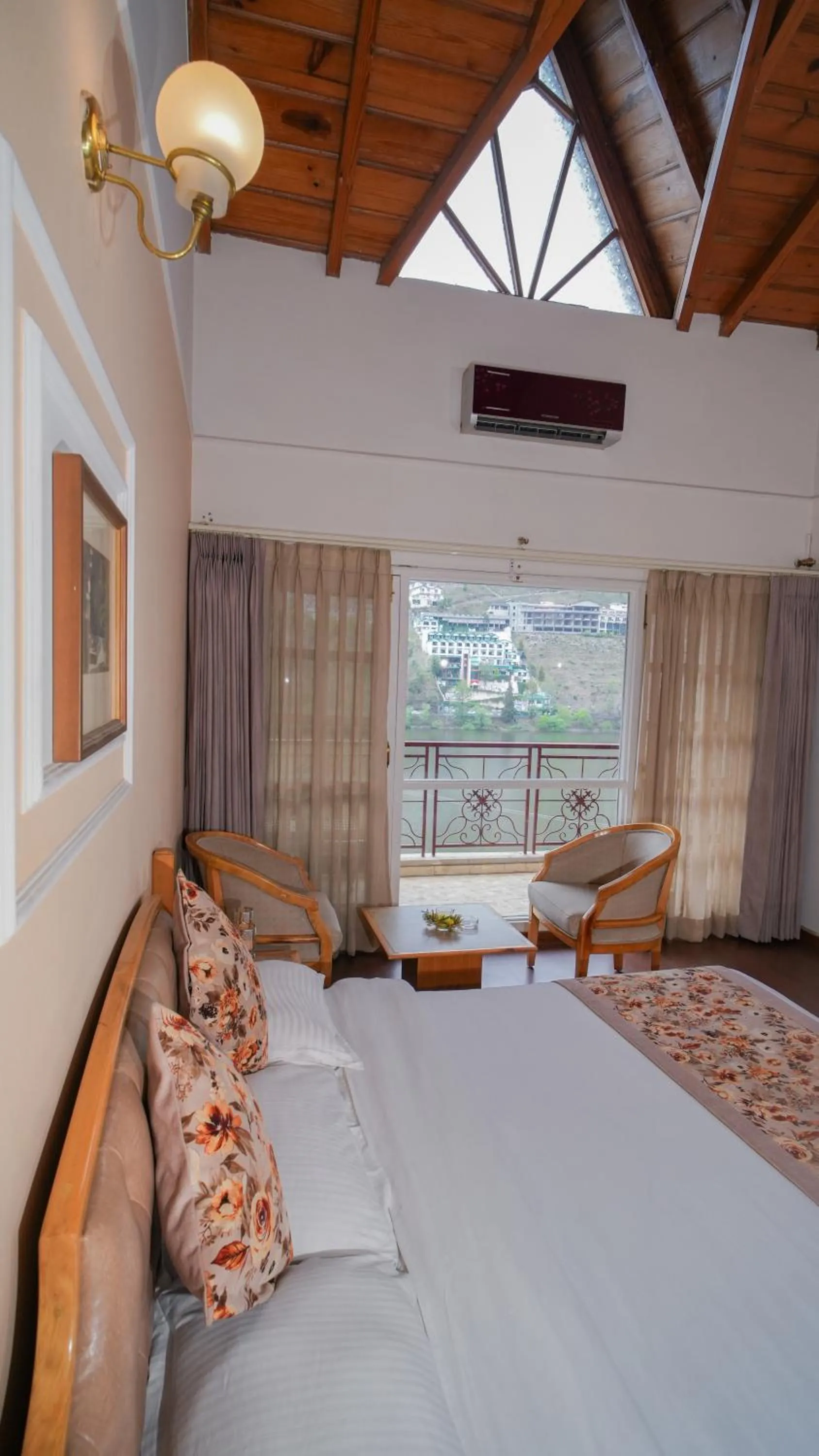Living room, Bed in Neelesh Inn- A Luxury Lake View Hotel- 20 kms from Nainital
