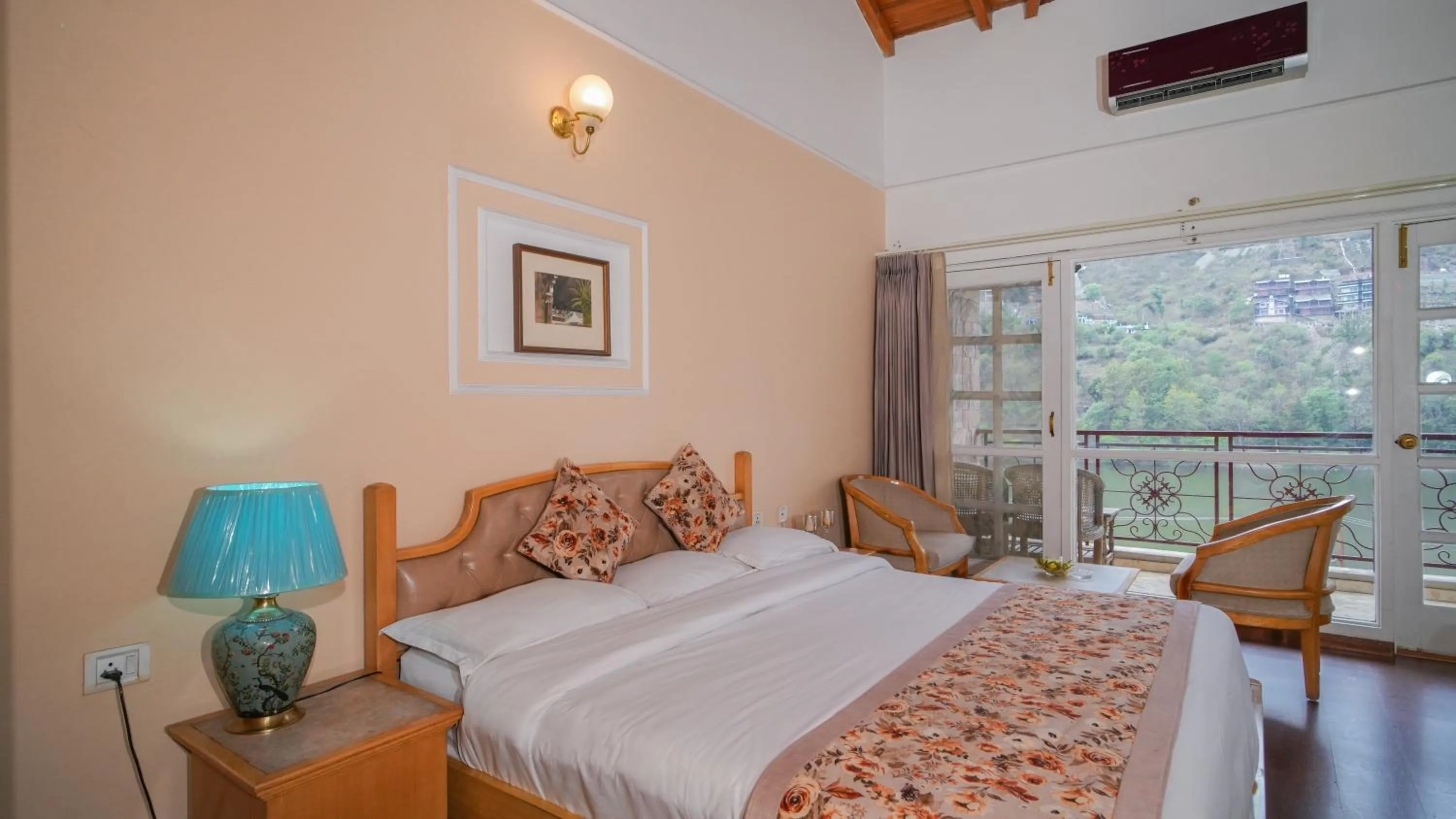 Photo of the whole room, Bed in Neelesh Inn- A Luxury Lake View Hotel- 20 kms from Nainital