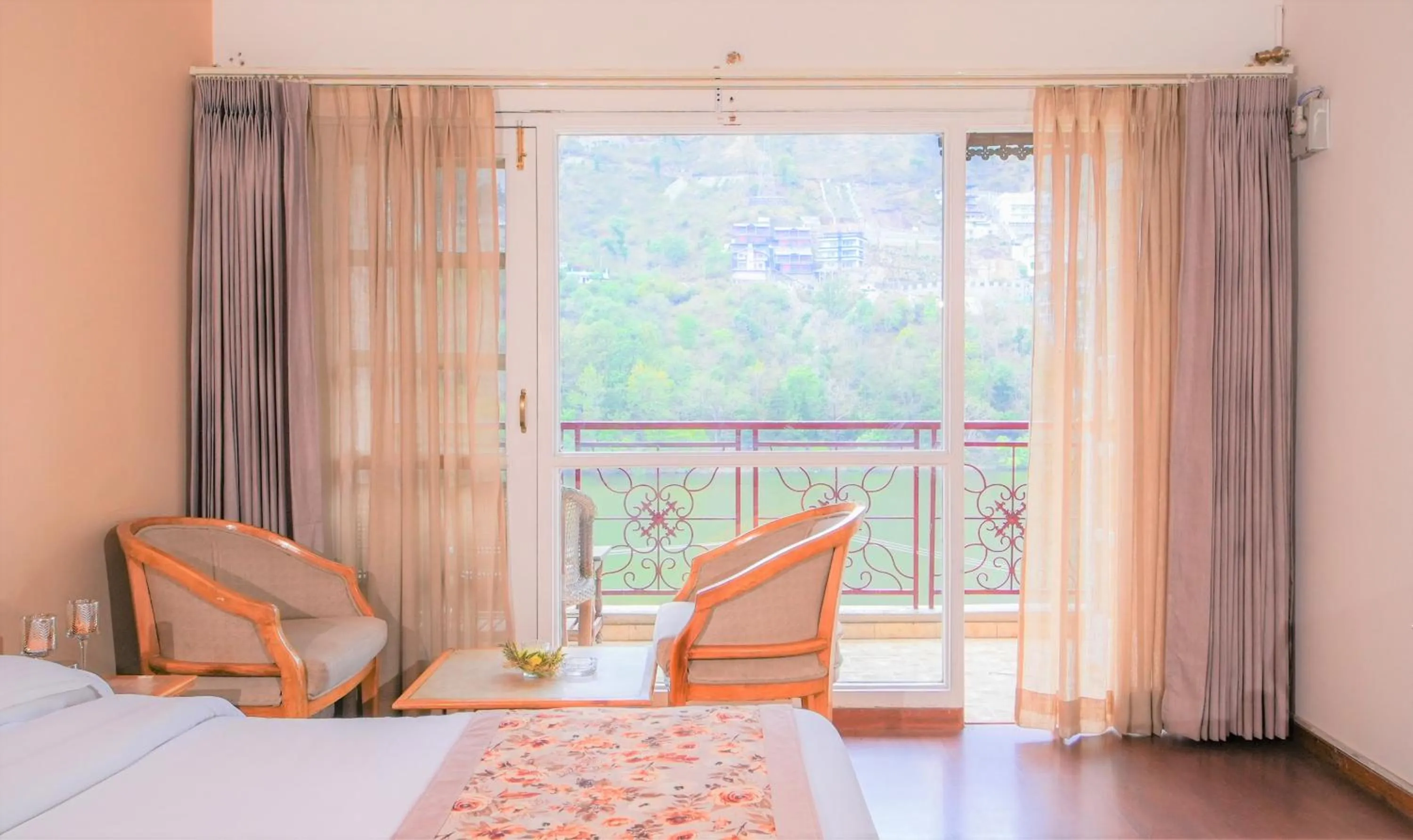 Bed in Neelesh Inn- A Luxury Lake View Hotel- 20 kms from Nainital