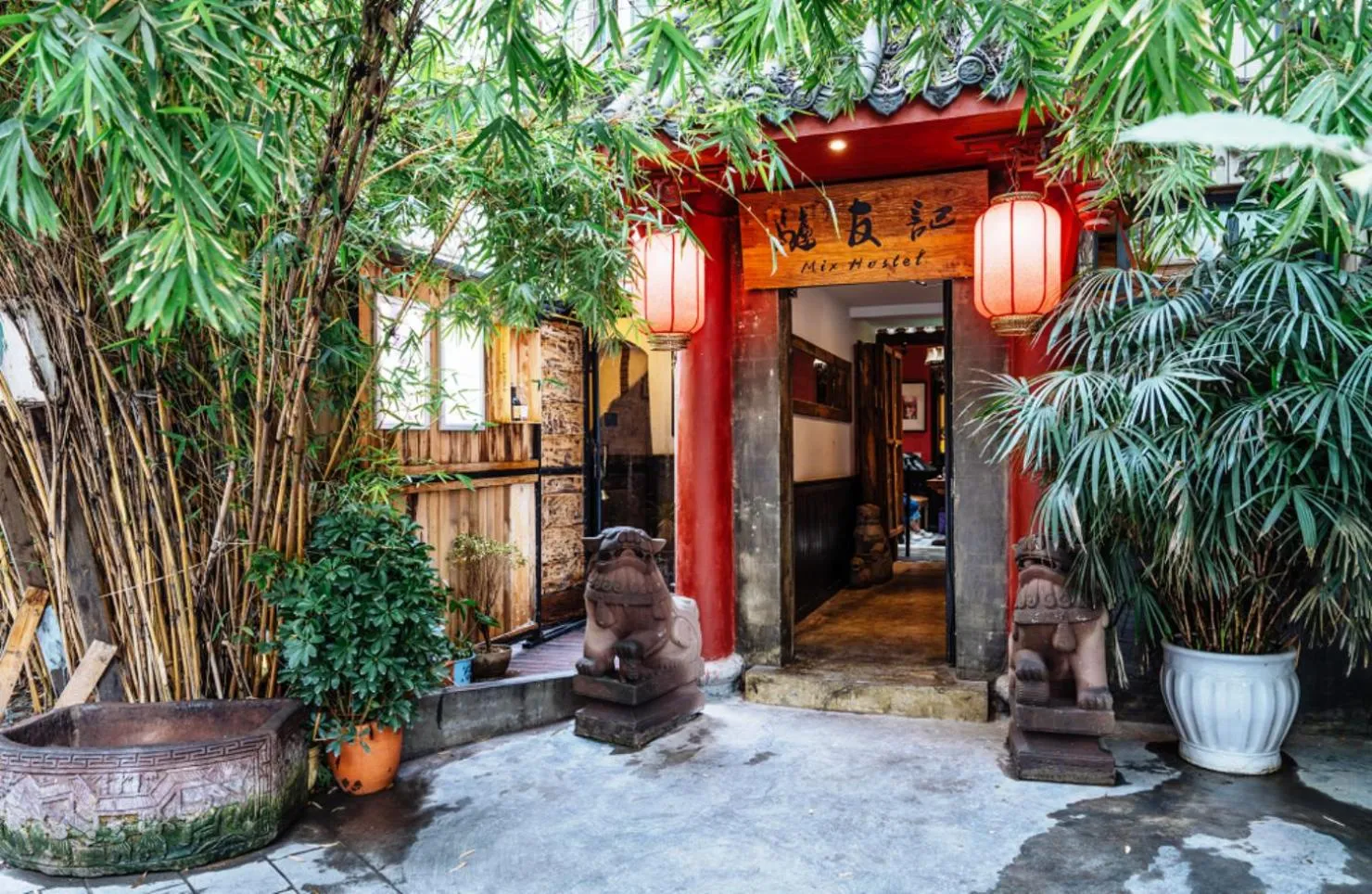 Property building in Chengdu Mix Hostel - Next To Wenshu Monastery - Sichuan Style Chill & Social Courtyard House - Free Activities - Friendly English Speaking Staff - Tibet, Panda, Buddha & Snow Mountain Tours