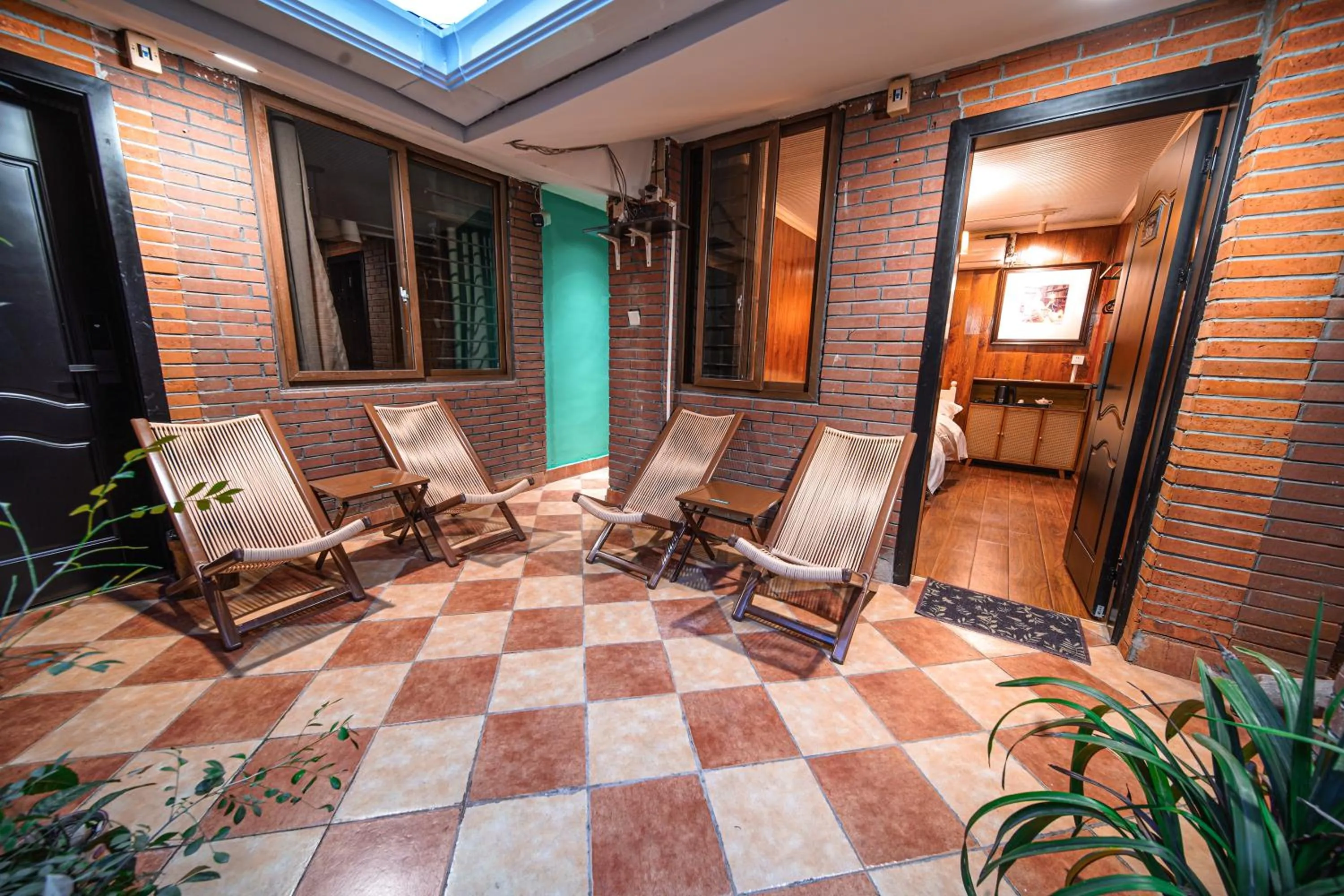 Seating area in POSHPACKER - Chengdu Mix Hostel - Cicada Zen Yard