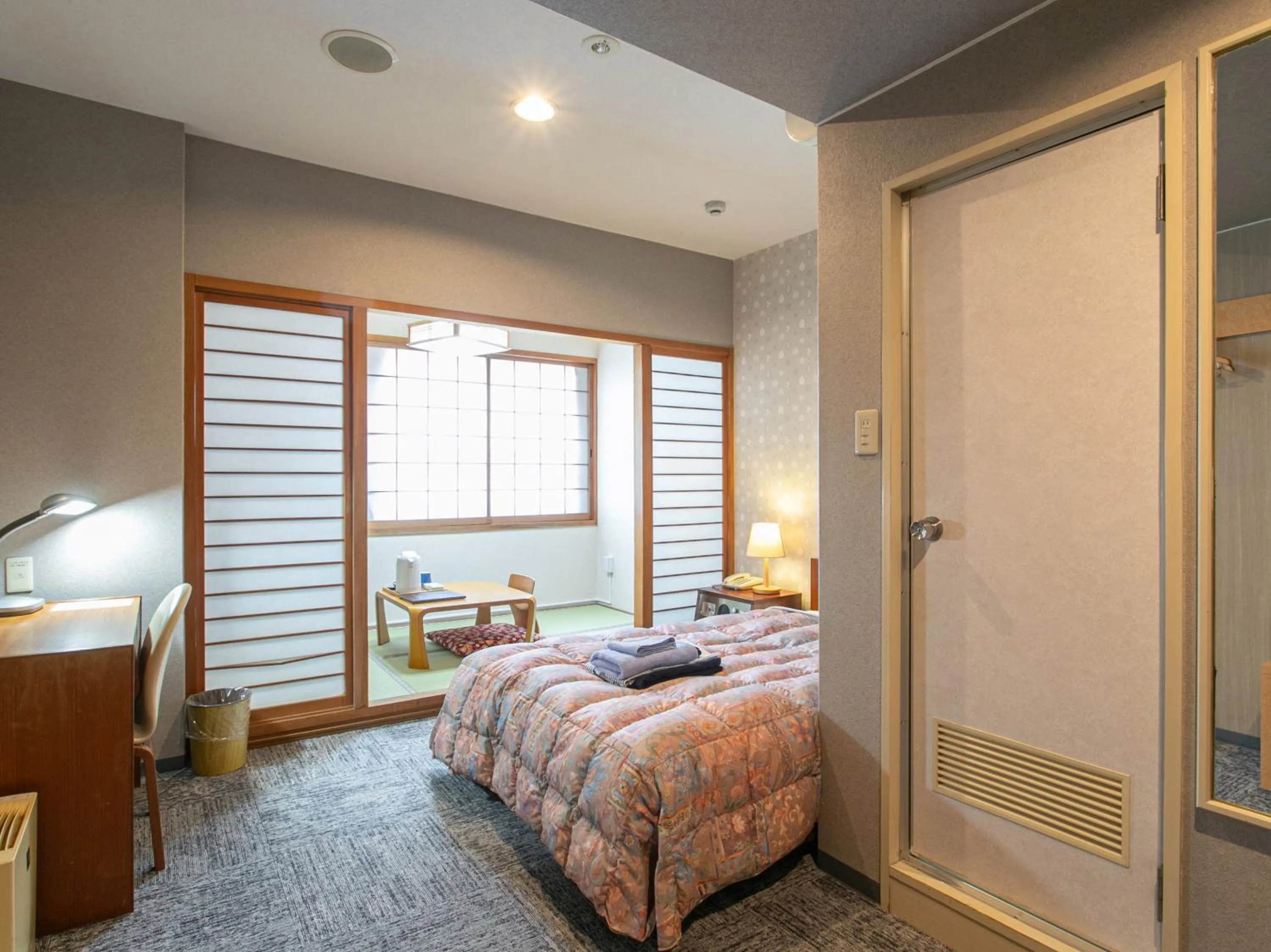 Bed in Aqua Garden Hotel Fukumaru