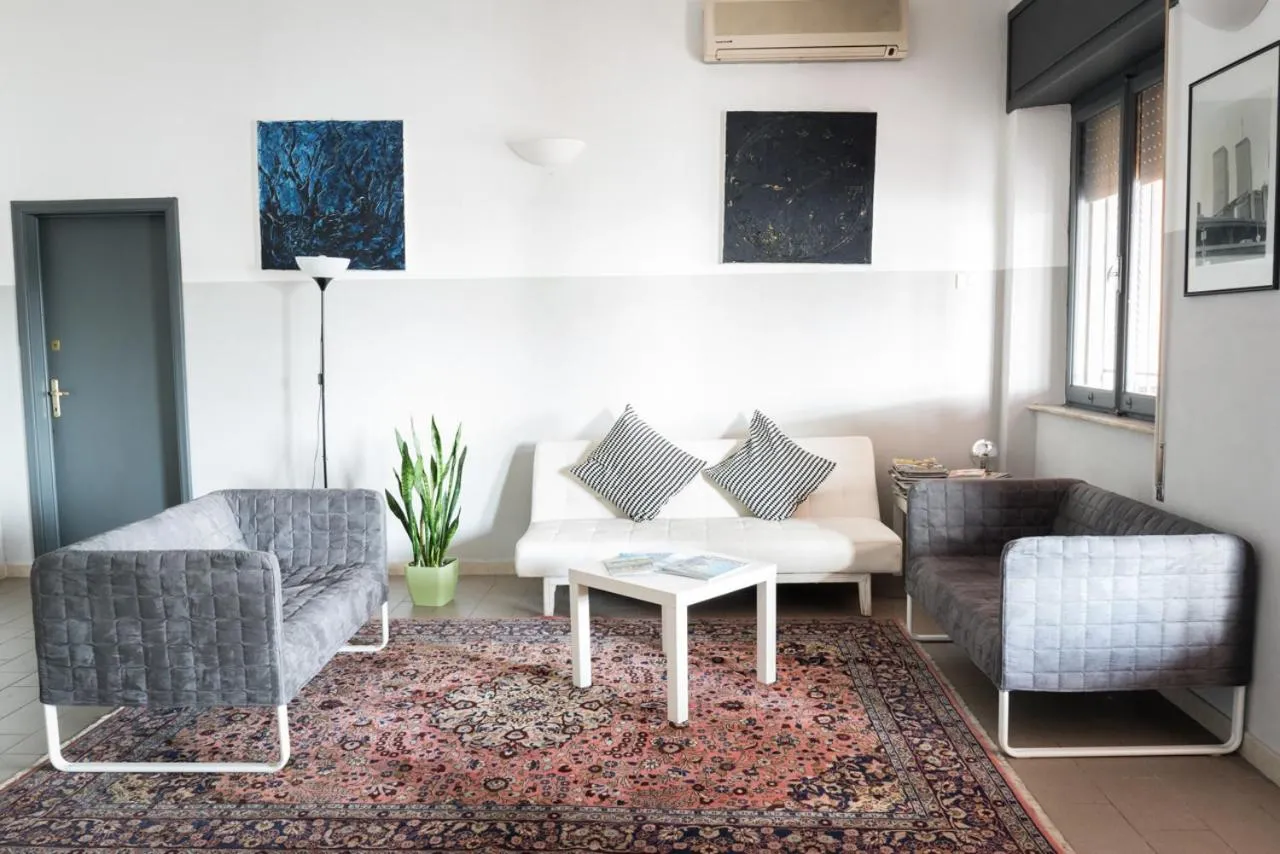 Communal lounge/ TV room in Hotel da Renato