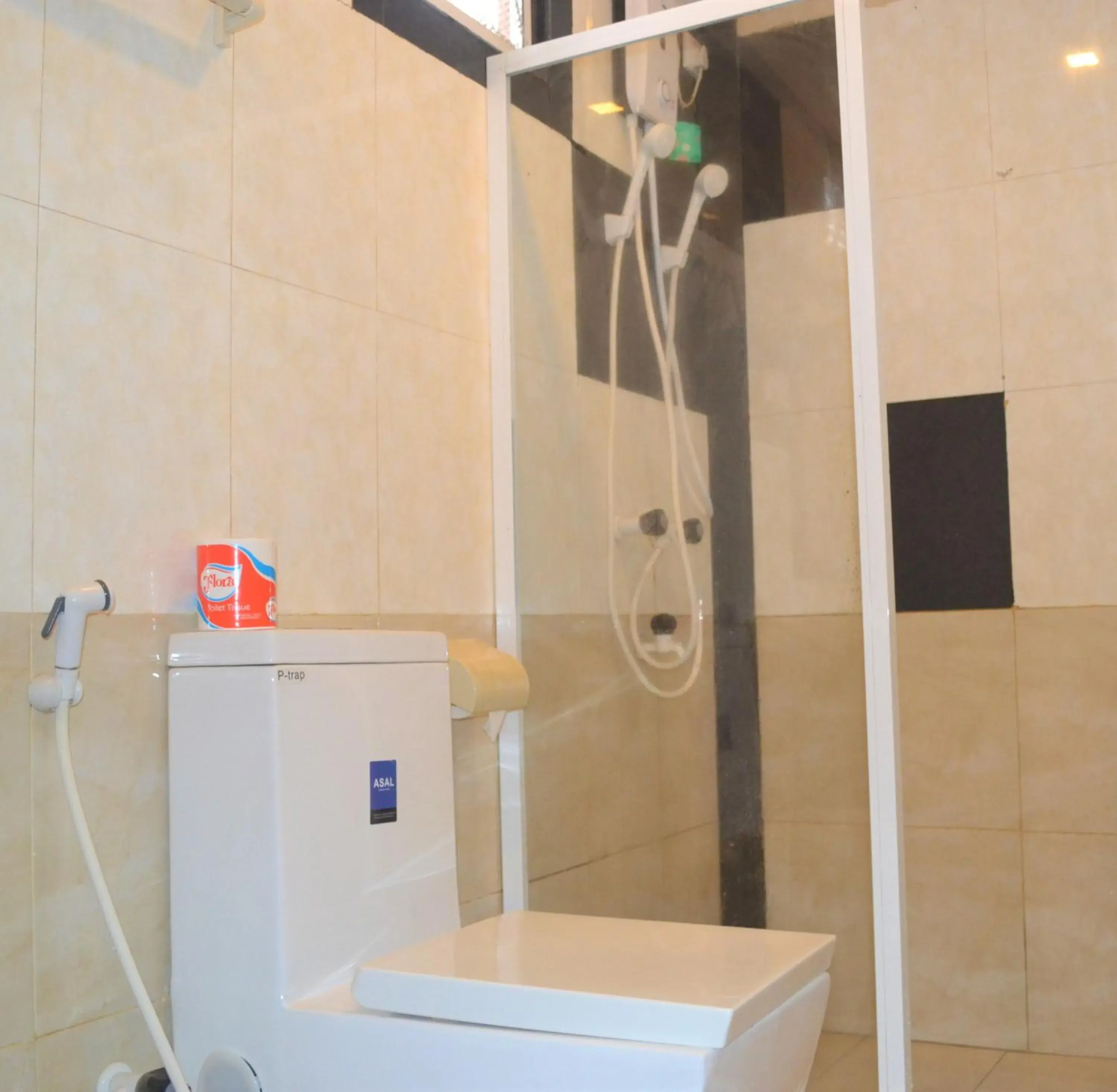 Bathroom in Green Grass Hotel & Restaurant Bathroom in Green Grass Hotel & Restaurant