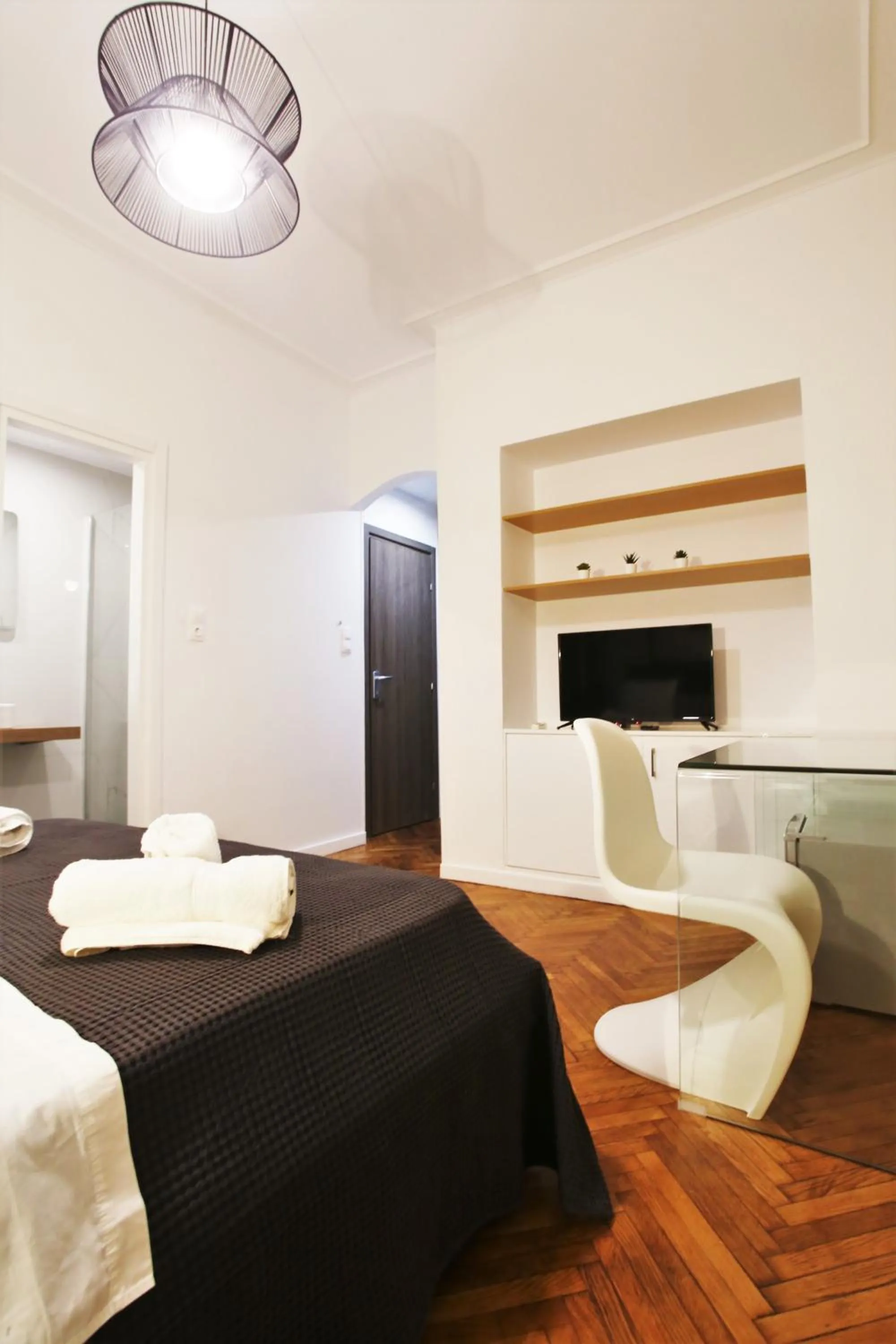 Photo of the whole room, Bed in GK Niki by GK Properties