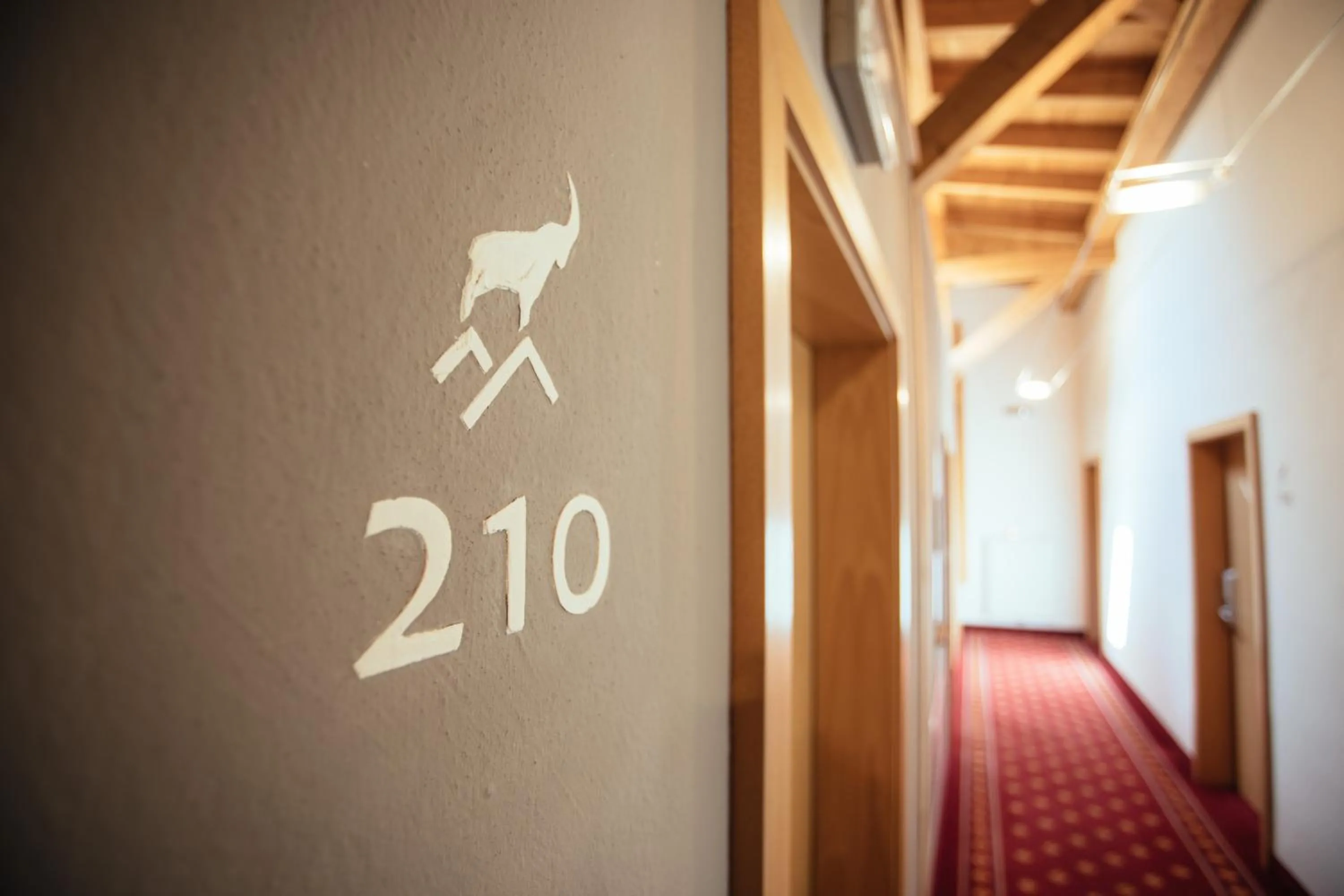 Property logo or sign in Hotel Wildschütz