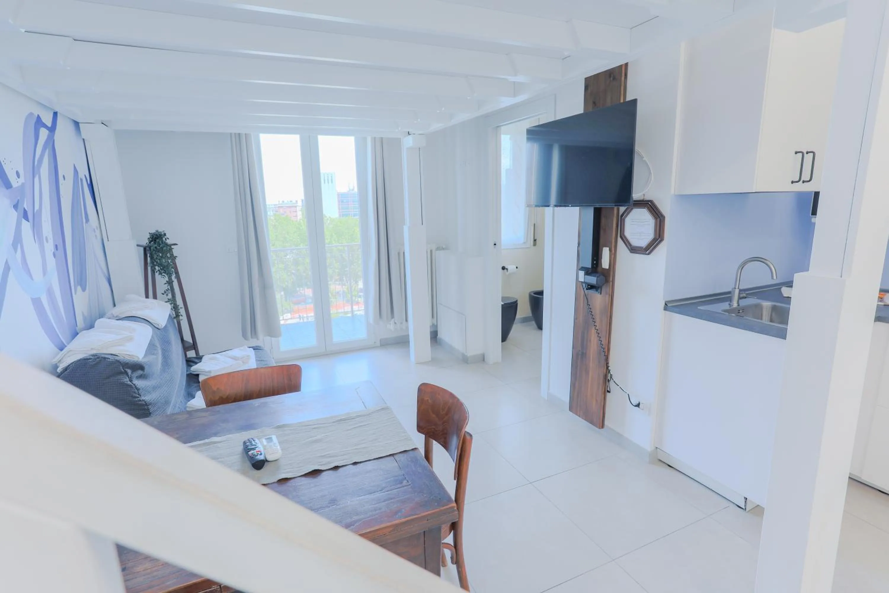 Photo of the whole room in HOLABOLOGNA Luxury Rooms and Flats