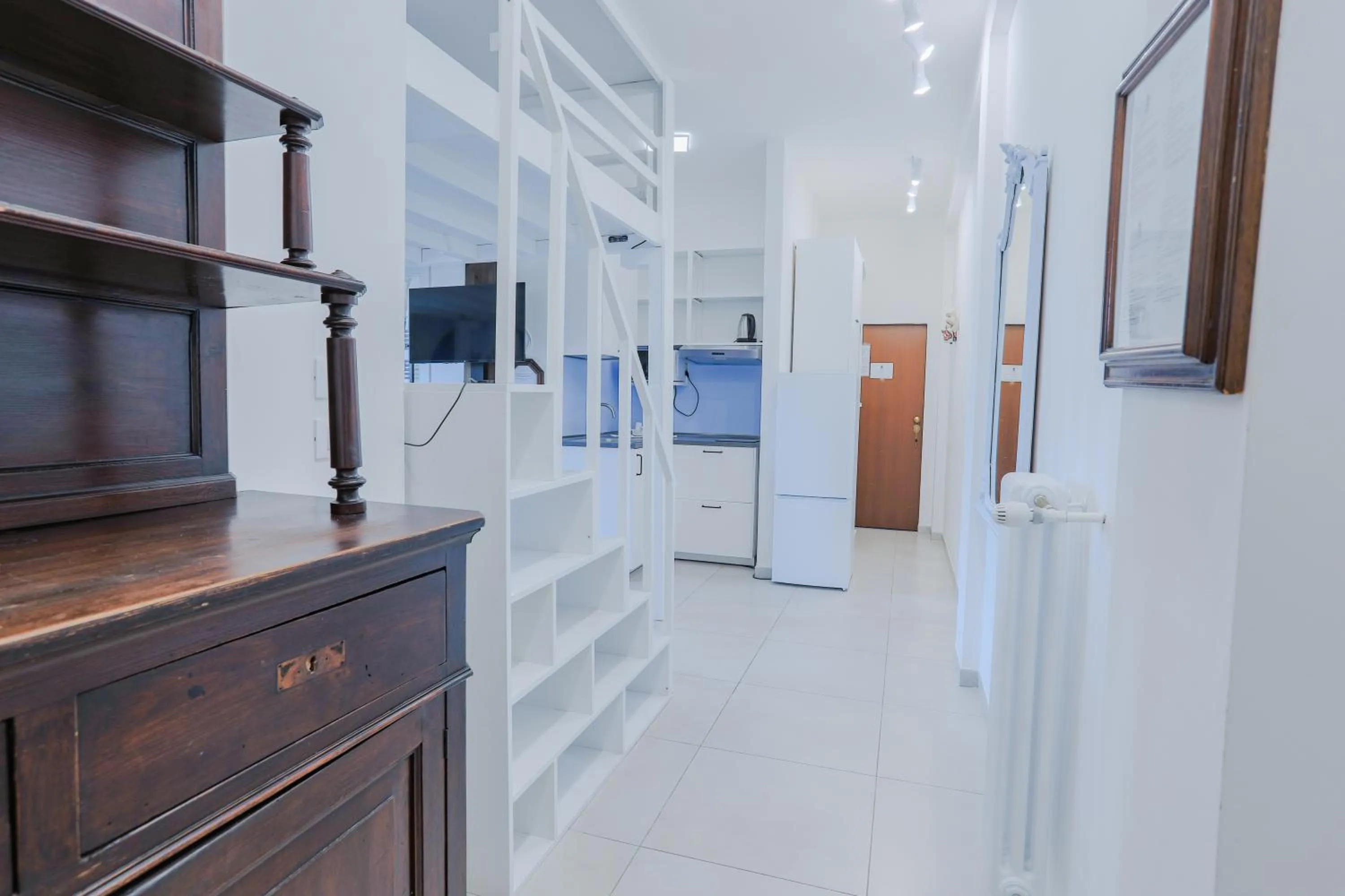 Photo of the whole room in HOLABOLOGNA Luxury Rooms and Flats