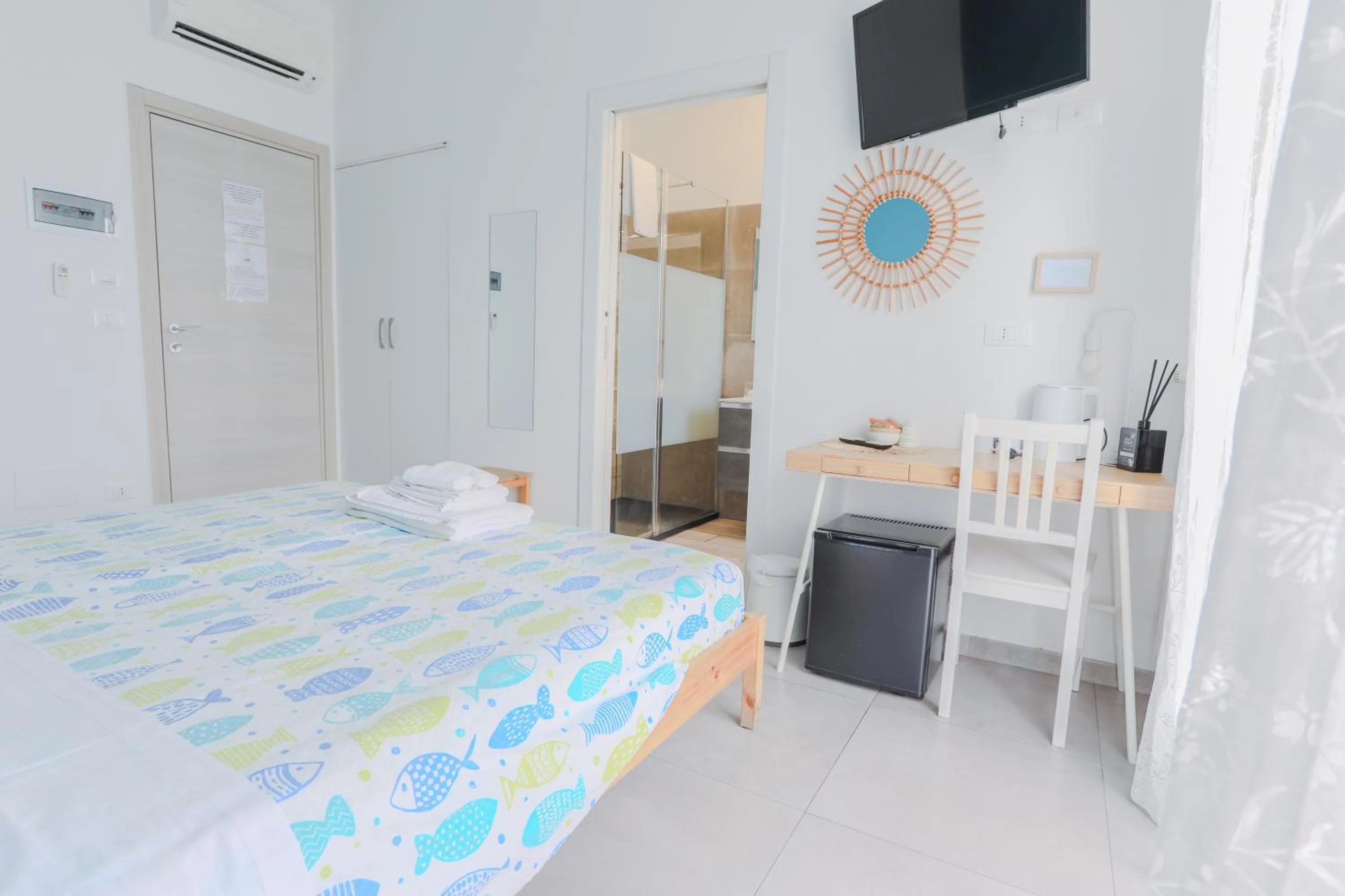 Bed in HOLABOLOGNA Luxury Rooms and Flats