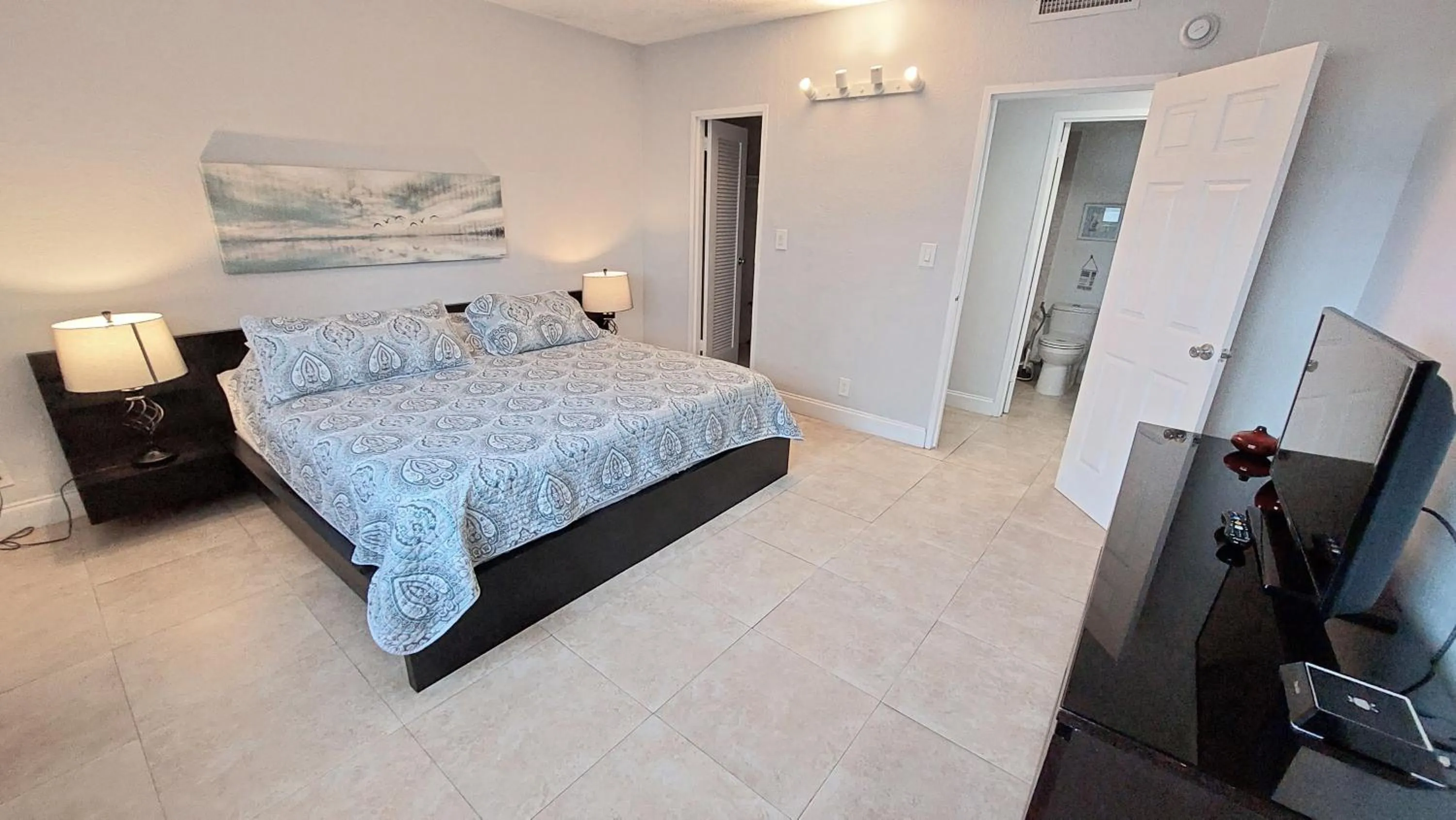 Bedroom, Bed in The Tides Apartments on the beach