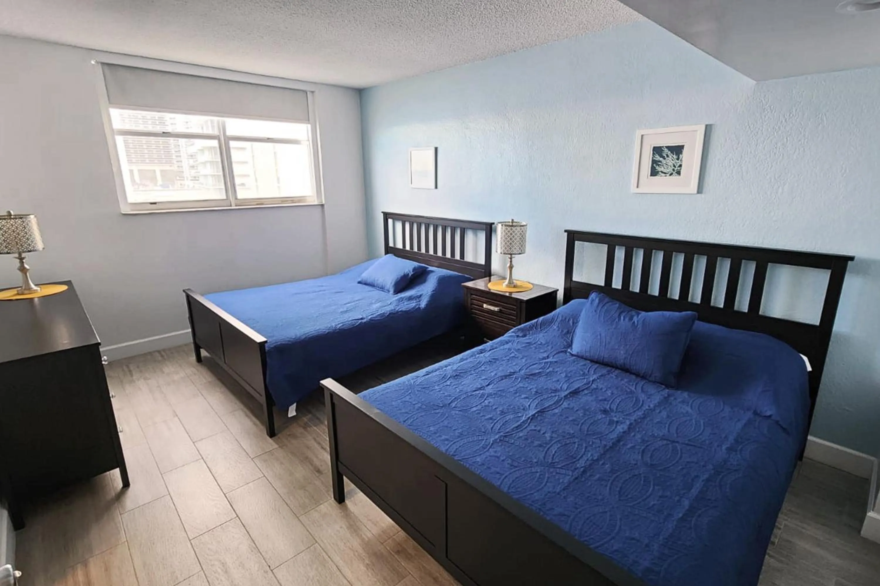 Bedroom, Bed in The Tides Apartments on the beach