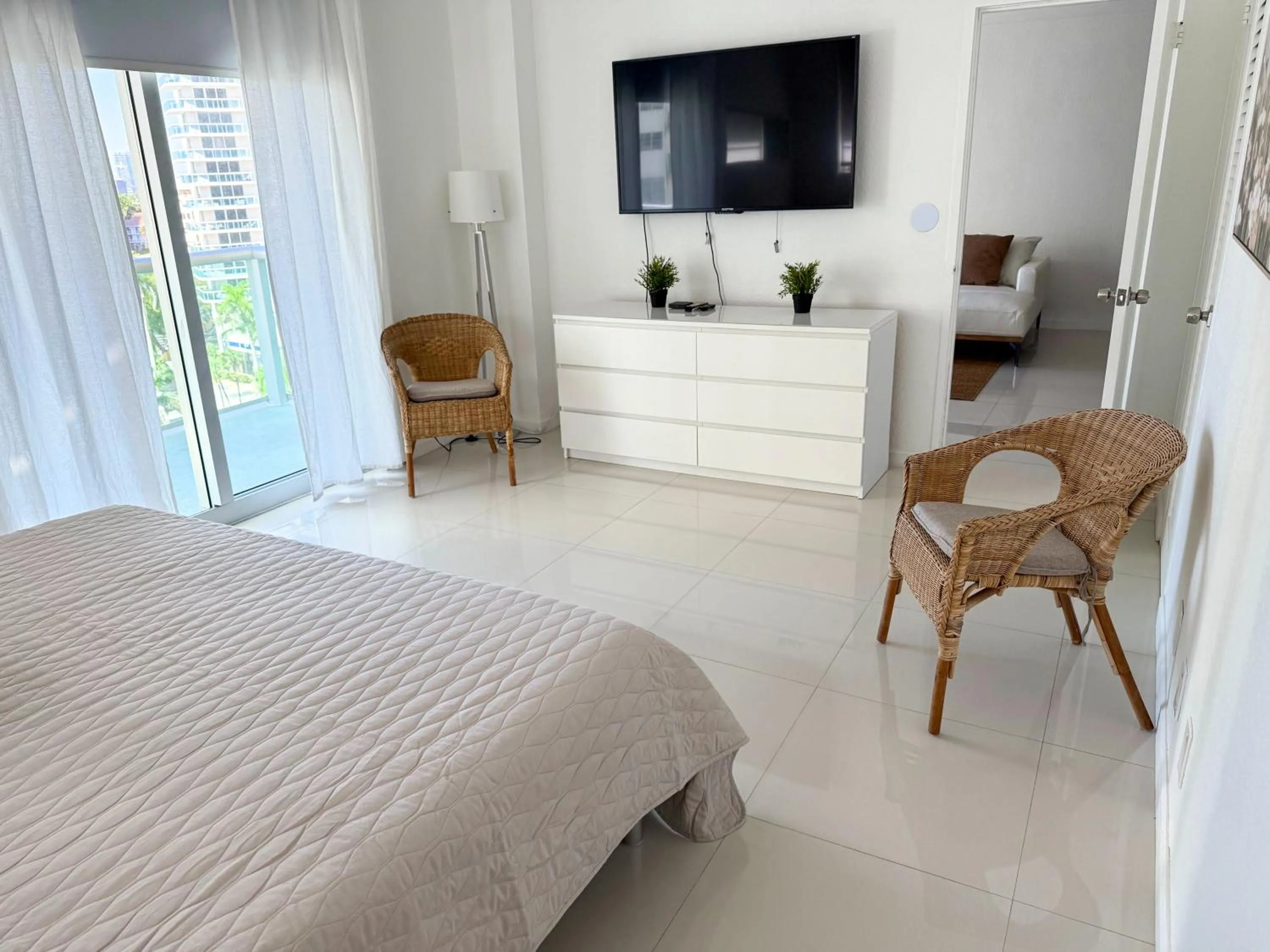 Bedroom, Bed in The Tides Apartments on the beach