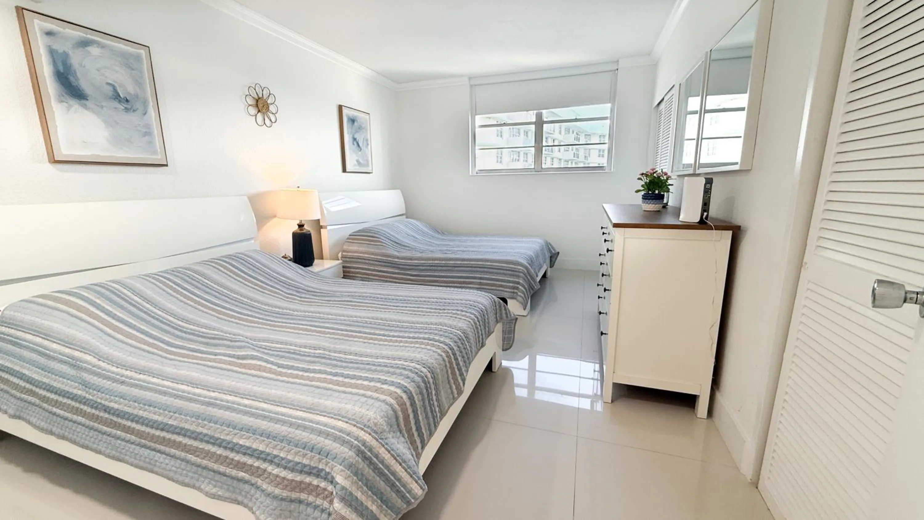 Bedroom, Bed in The Tides Apartments on the beach