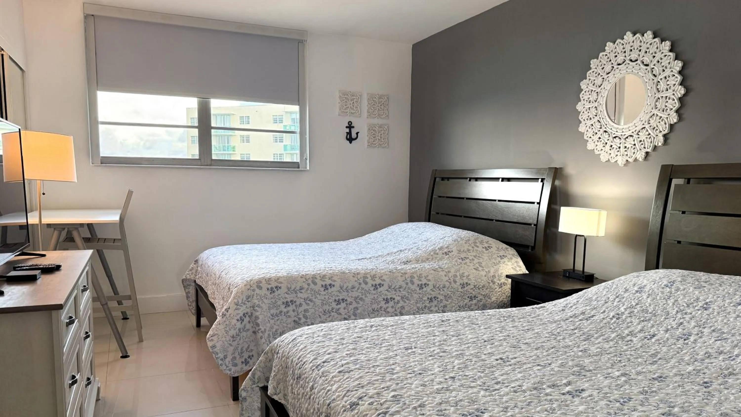 Bedroom, Bed in The Tides Apartments on the beach