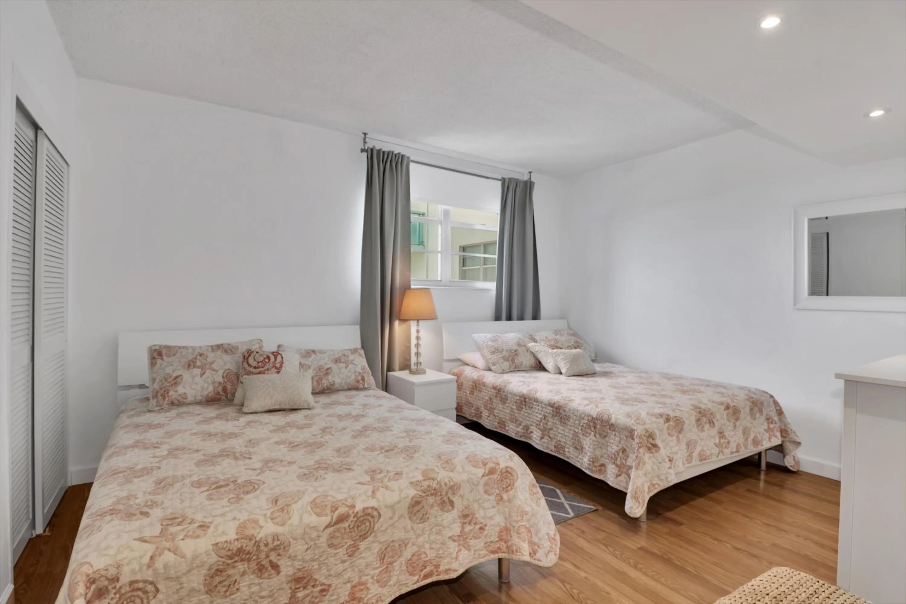 Bedroom, Bed in The Tides Apartments on the beach