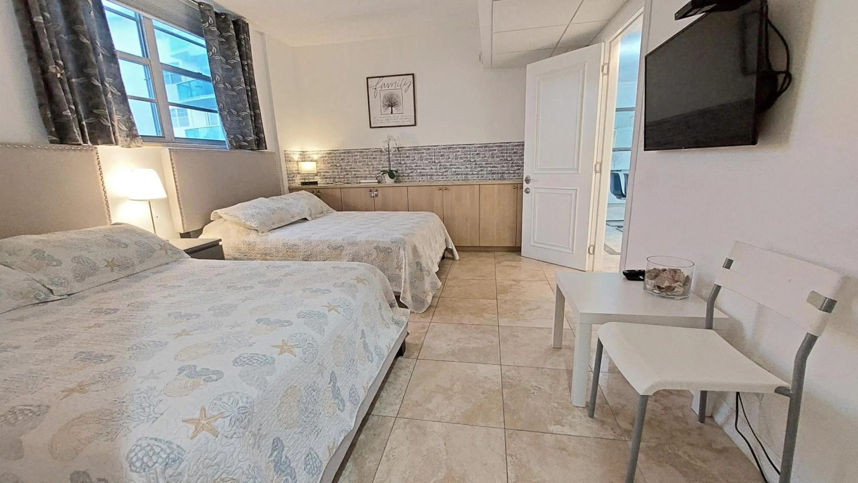 Bedroom, Bed in The Tides Apartments on the beach