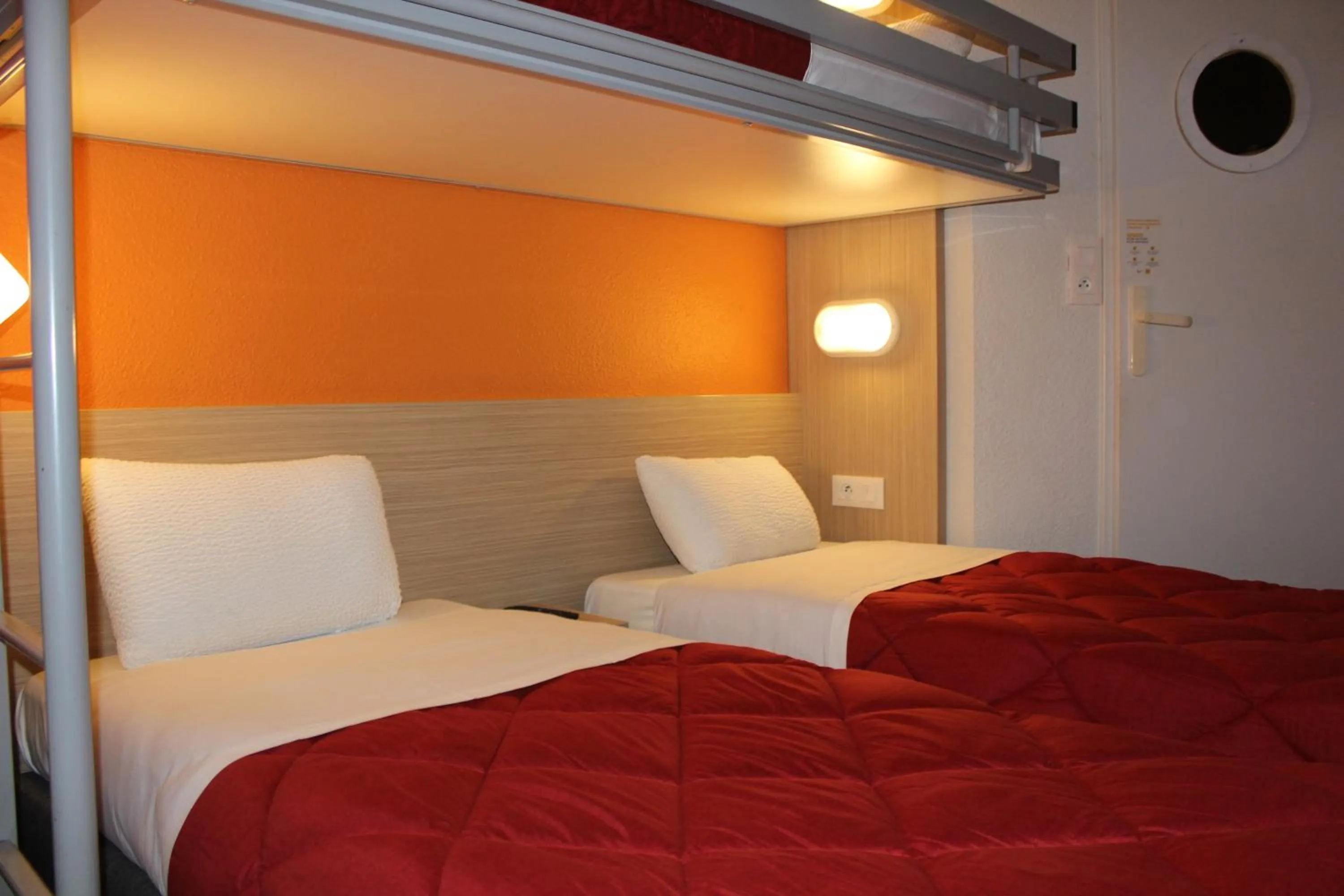 Bed in Premiere Classe St Quentin en Yvelines Elancourt