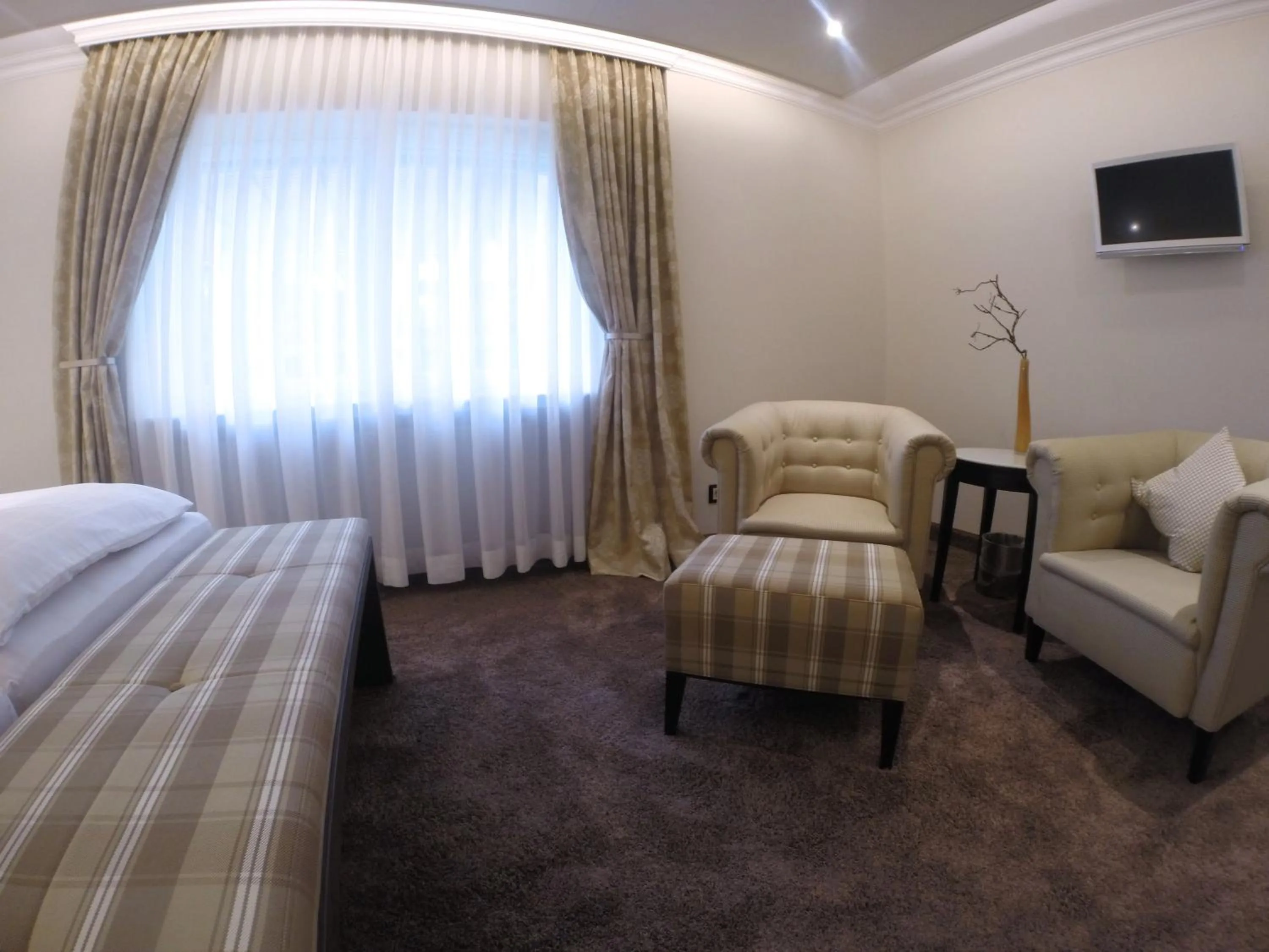 Seating area, Bed in Hotel Menge "An der Schlacht"