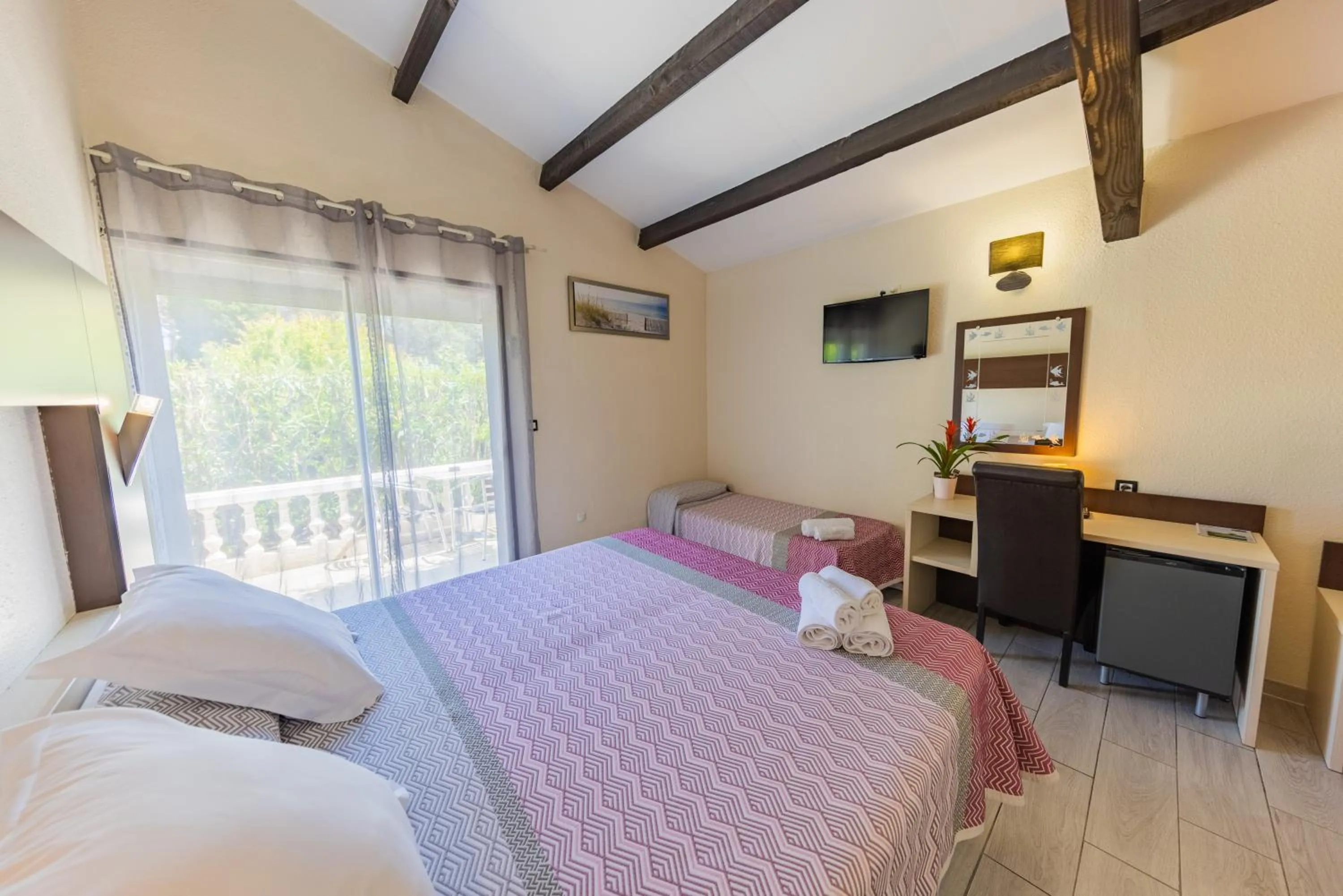 Photo of the whole room, Bed in Brit Hotel Confort Hélios Agde