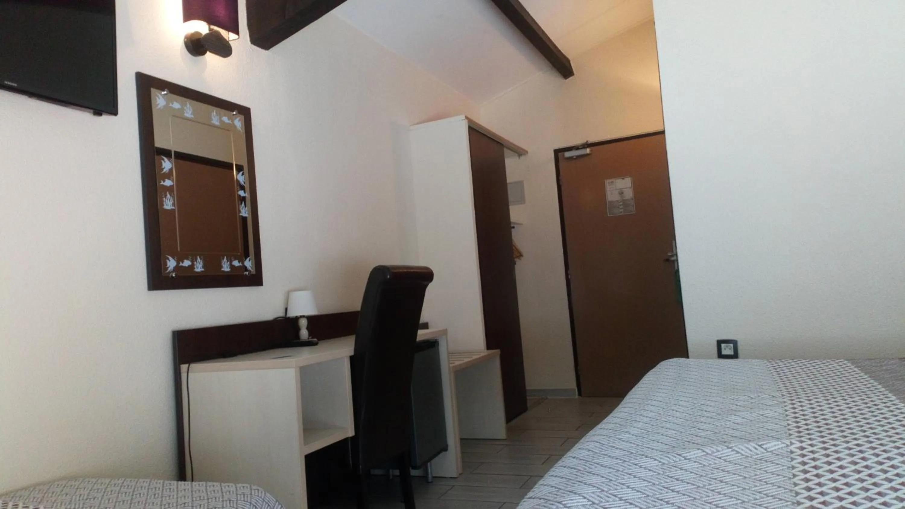 Photo of the whole room, Bed in Brit Hotel Confort Hélios Agde