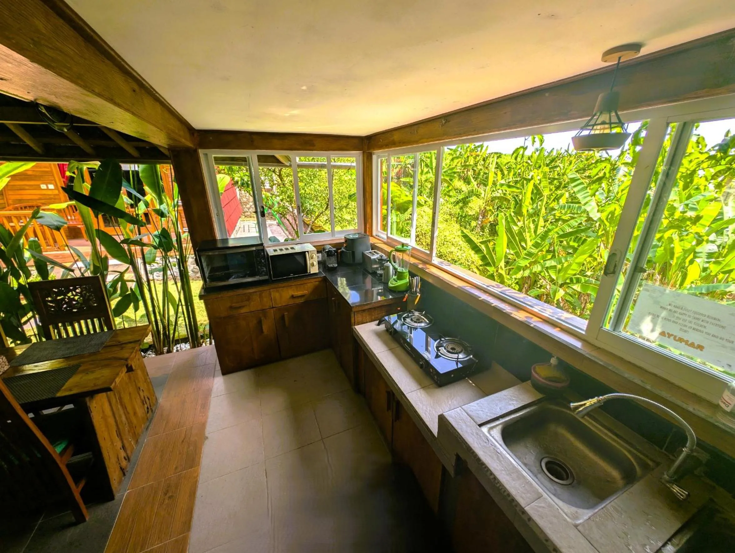 kitchen in Ayumar Homestay Medewi