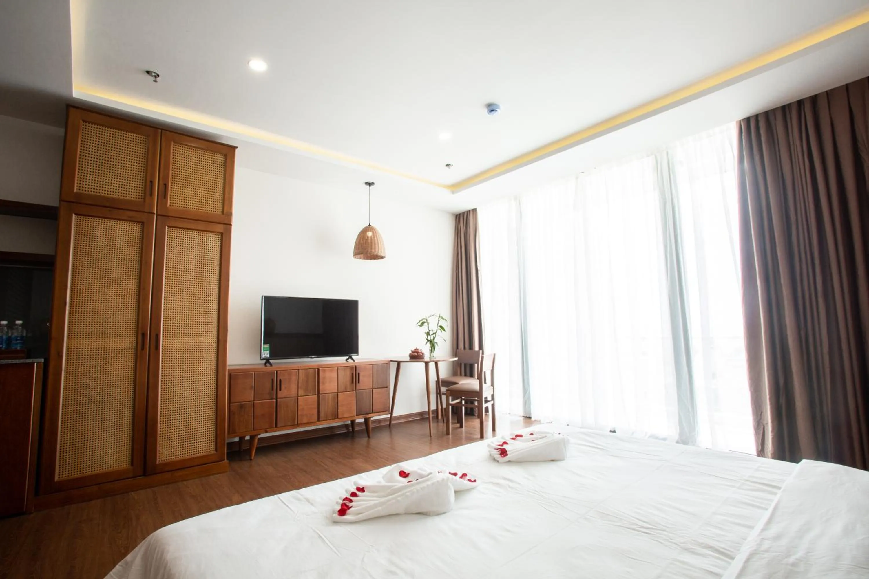 Communal lounge/ TV room, Bed in Luu Ngai Condotel Quy Nhon