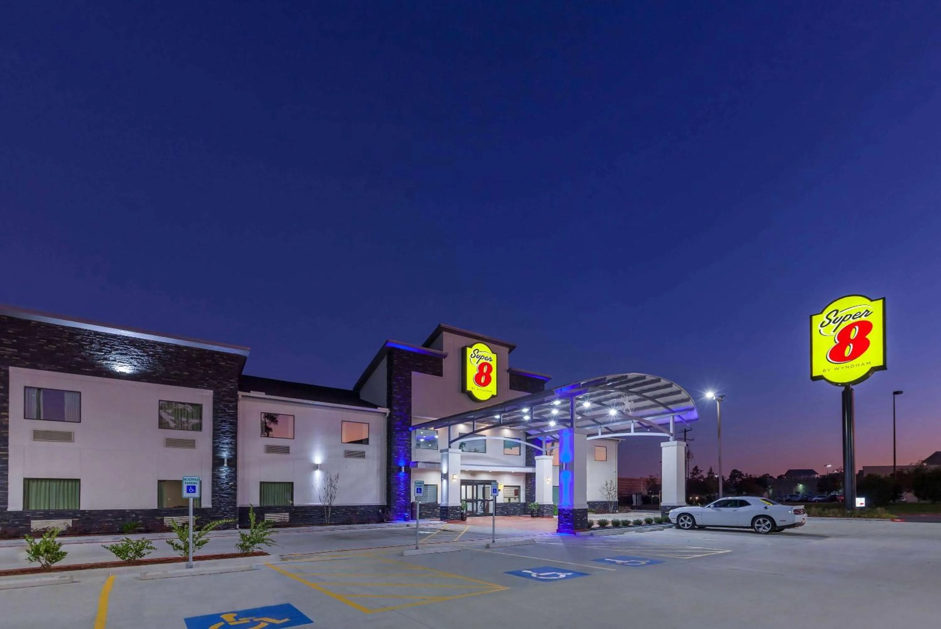 Property building in Super 8 by Wyndham Kingwood Houston North