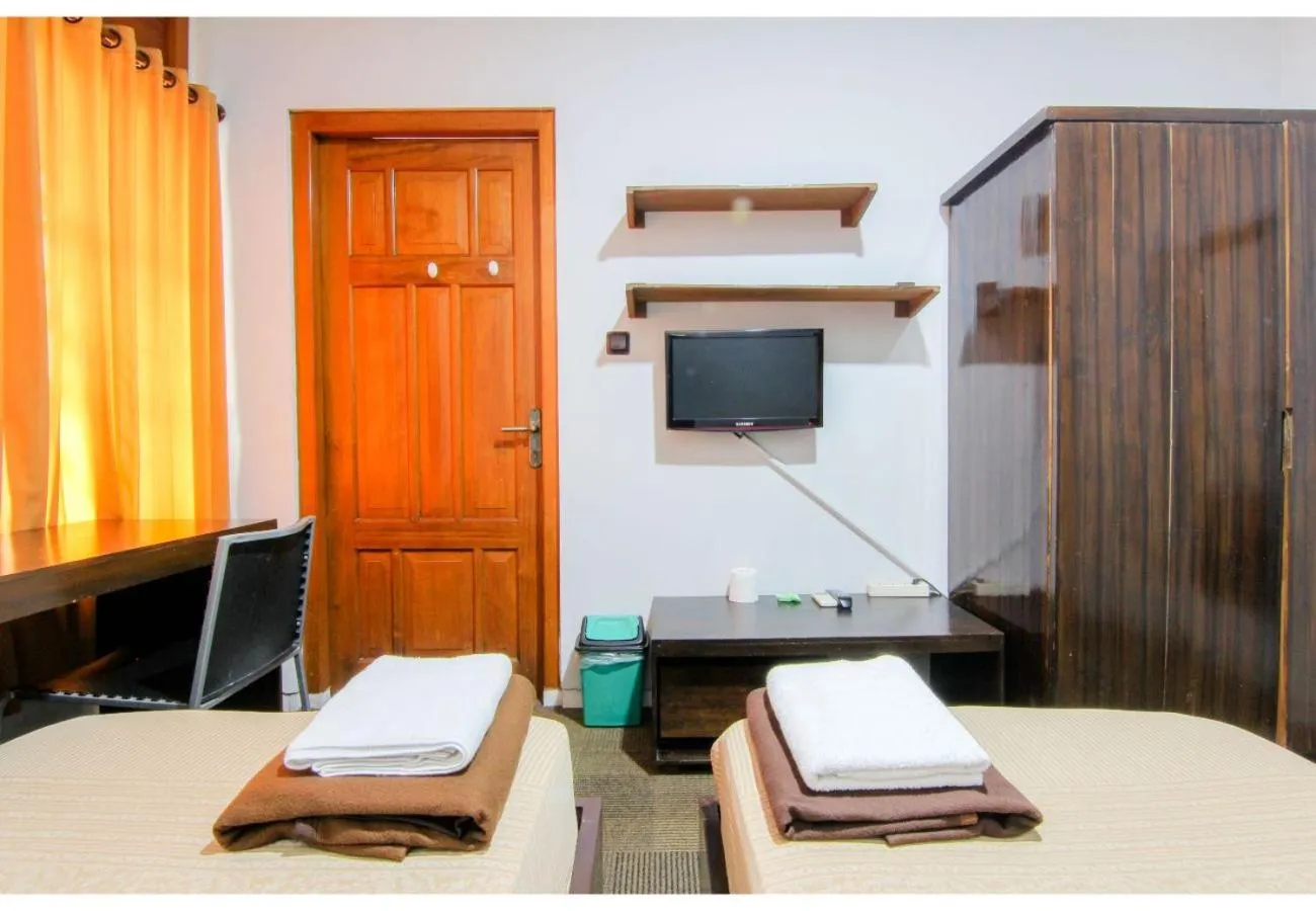 Living room, Bed in Embe Enem Homestay