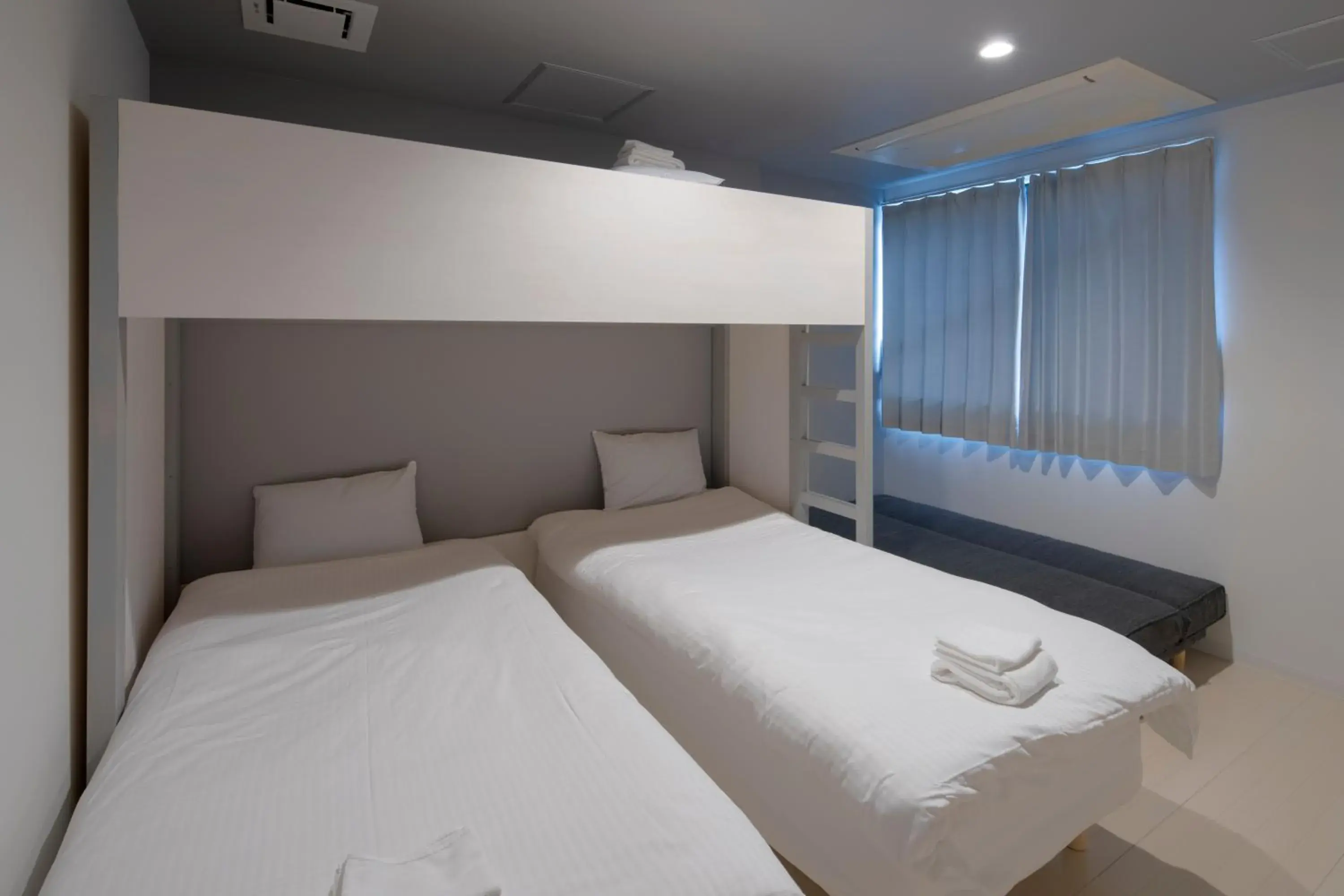 Economy Quadruple Room in Iwatoyama Hostel Economy Quadruple Room in Iwatoyama Hostel