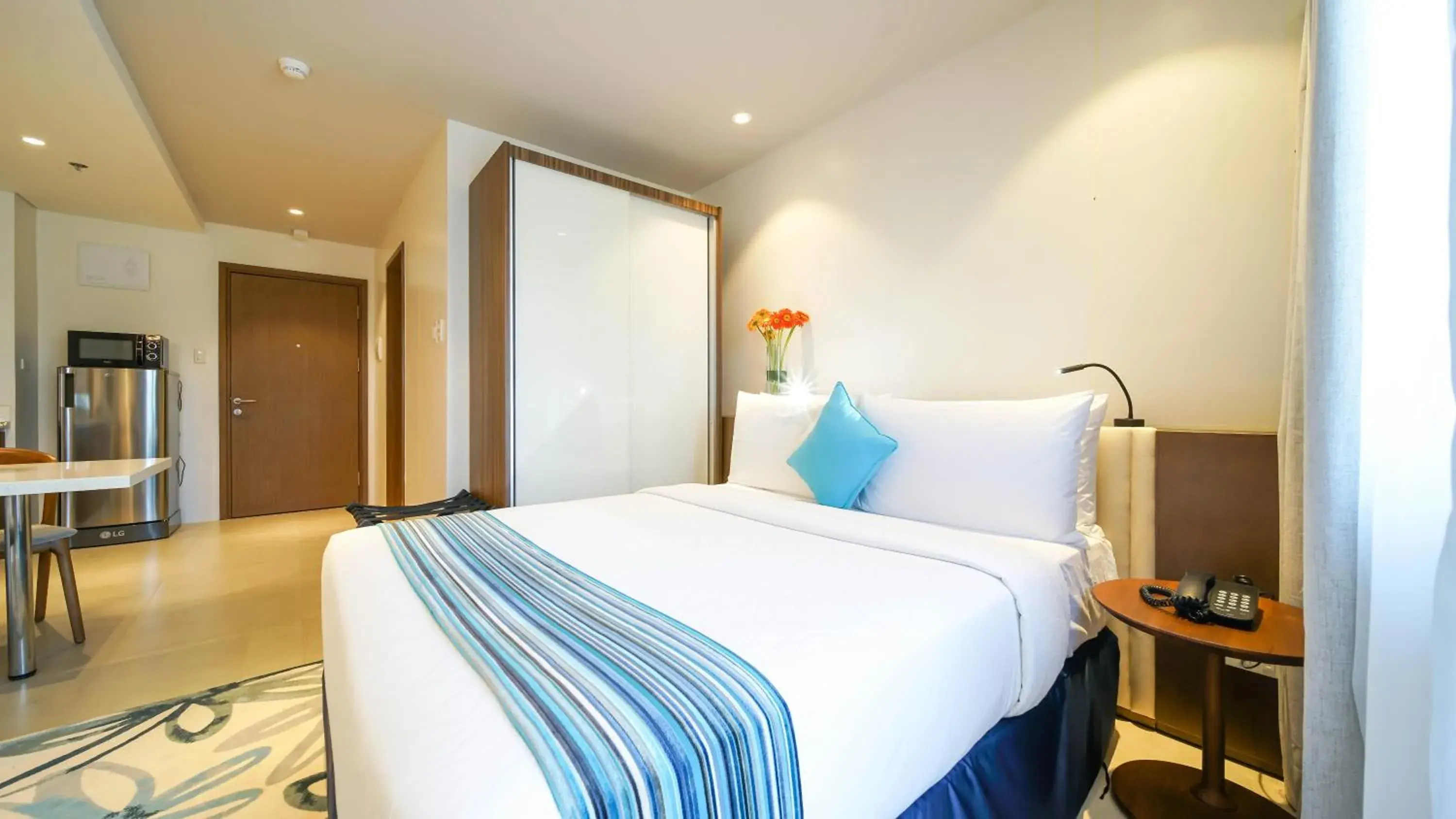 Bed in Tambuli Seaside Resort and Spa Bed in Tambuli Seaside Resort and Spa