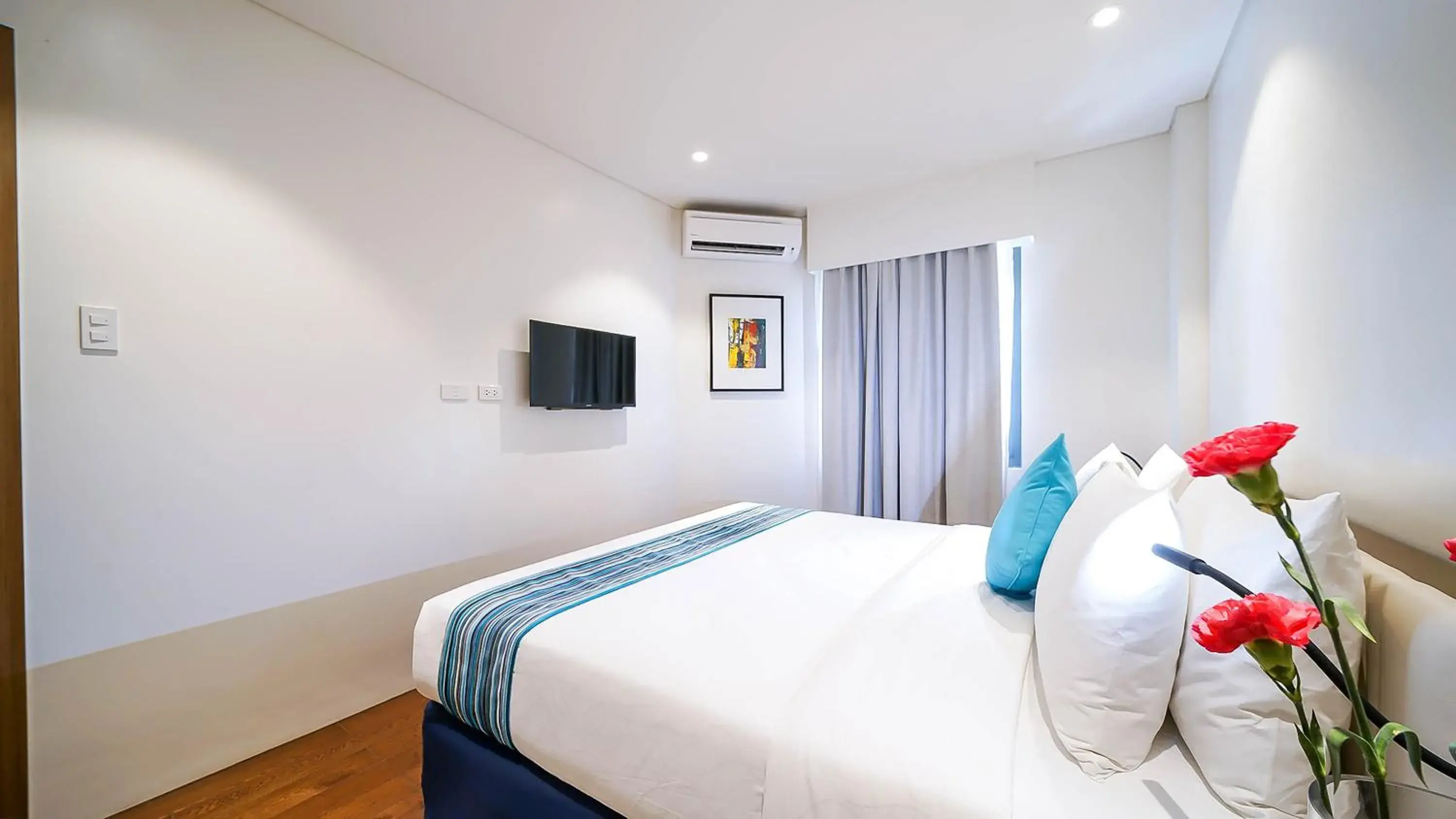 Bed in Tambuli Seaside Resort and Spa Bed in Tambuli Seaside Resort and Spa