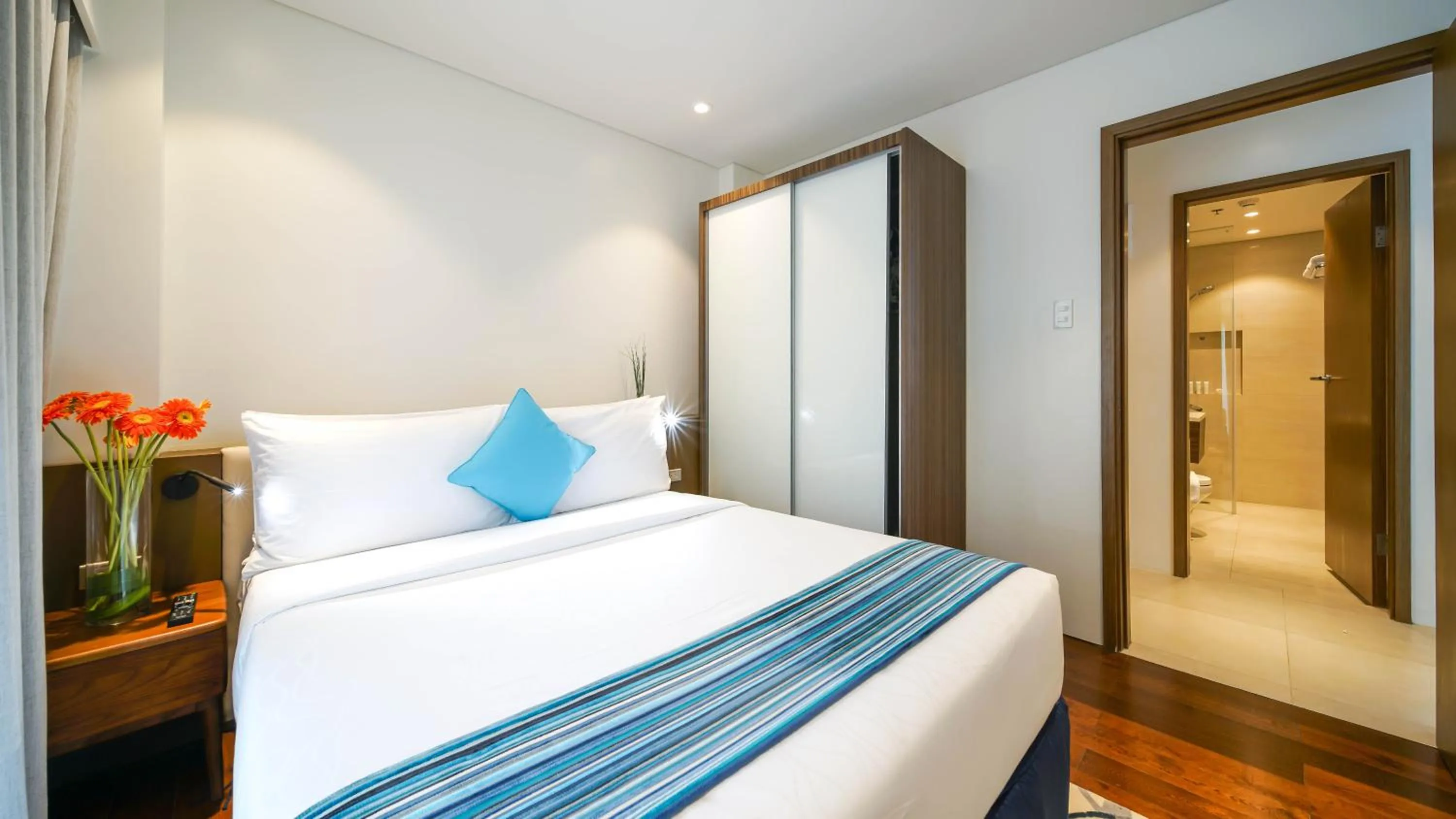 Bed in Tambuli Seaside Resort and Spa