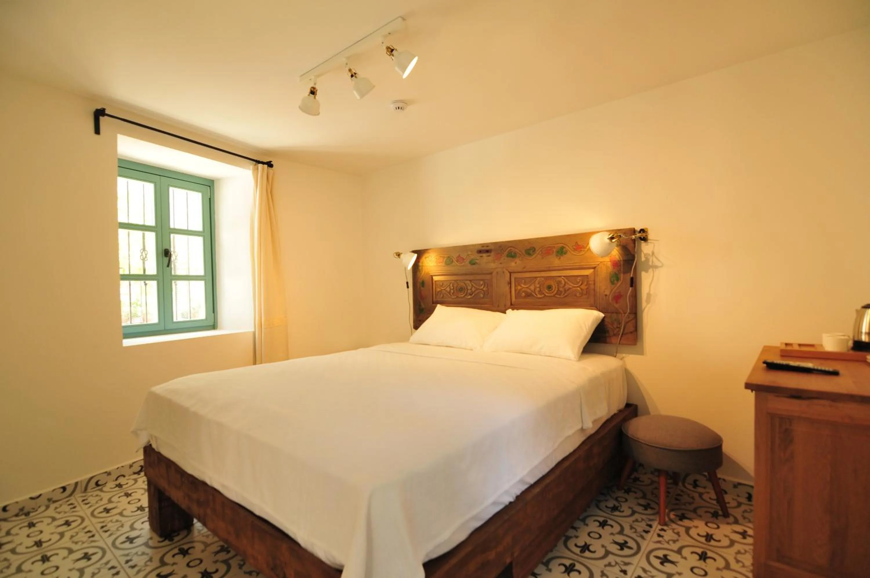 Bed in Oalis Boutique Hotel