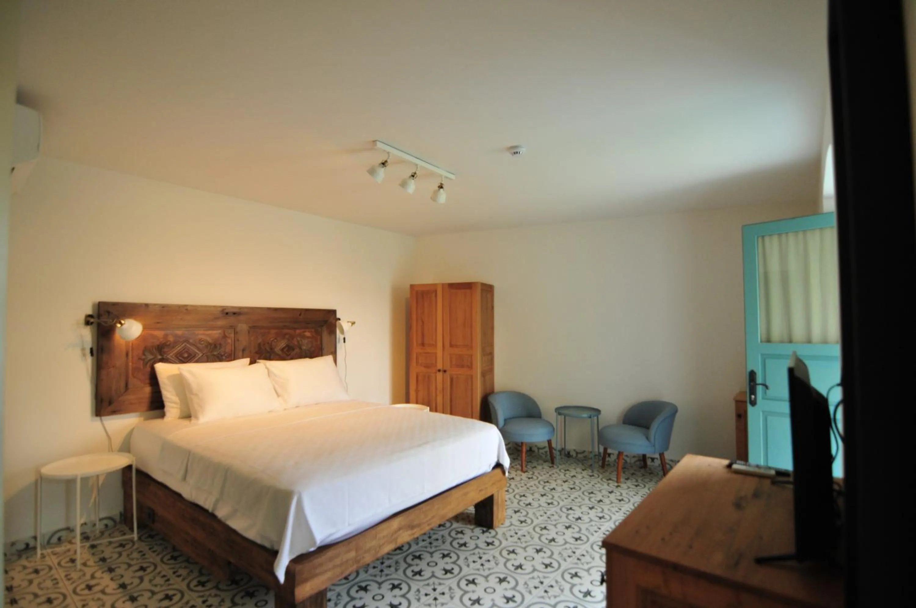 Bed in Oalis Boutique Hotel