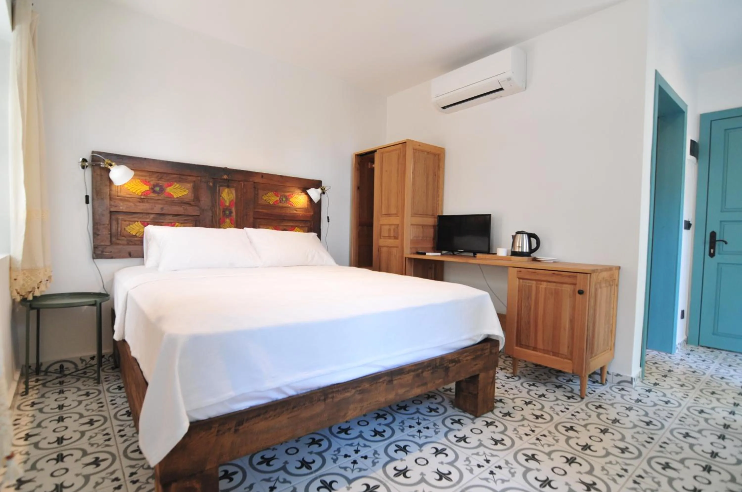 Bed in Oalis Boutique Hotel