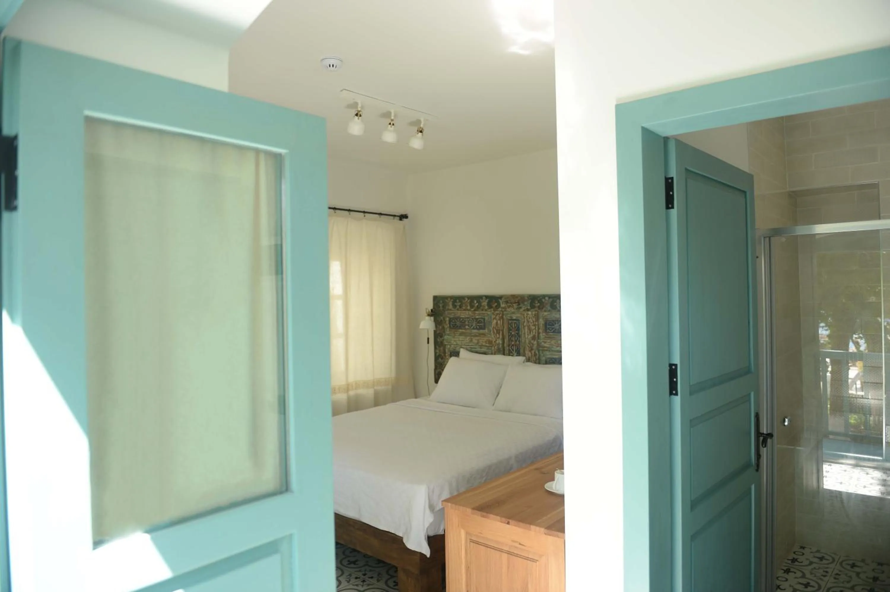 Bed in Oalis Boutique Hotel