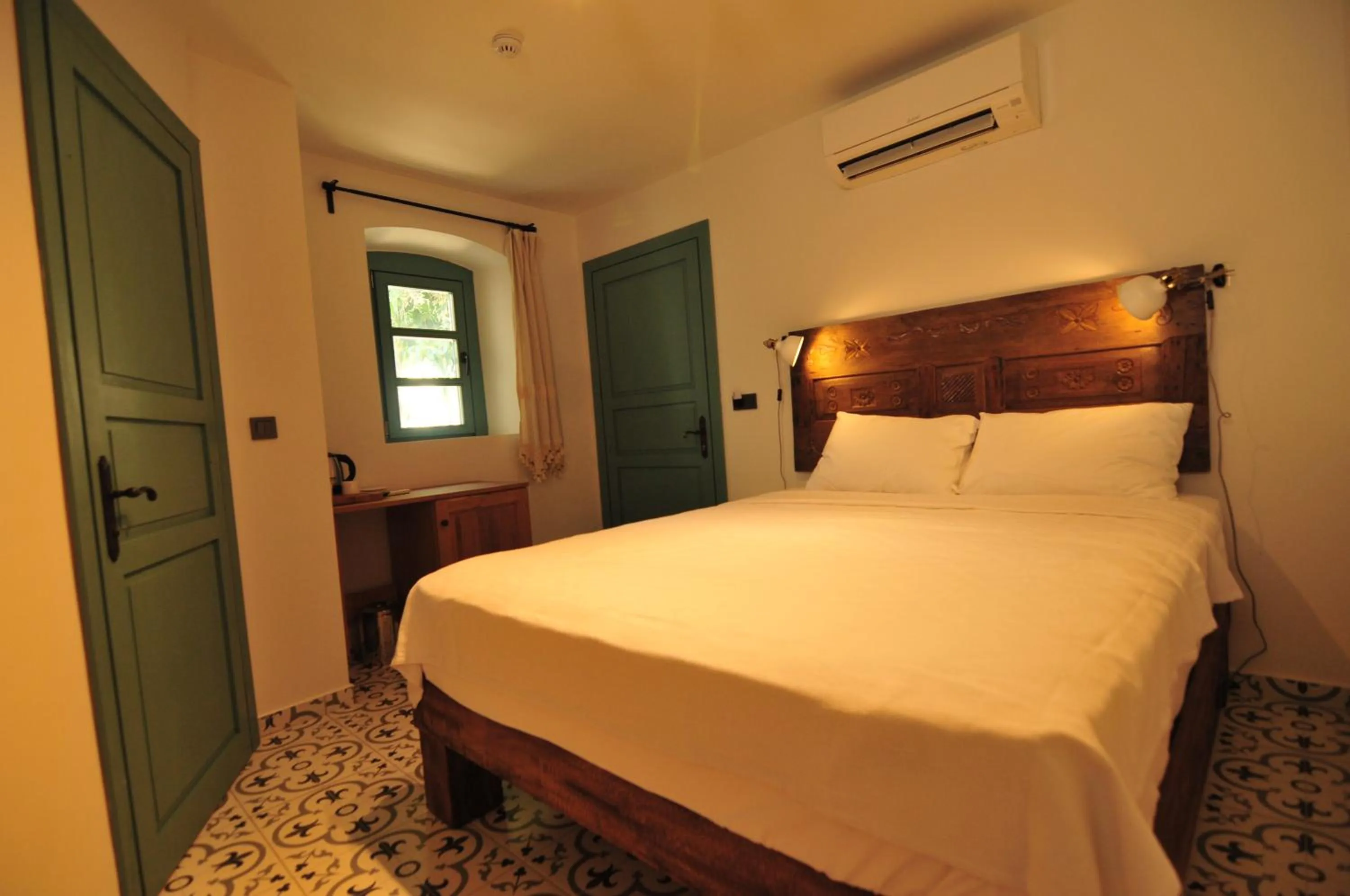 Bed in Oalis Boutique Hotel