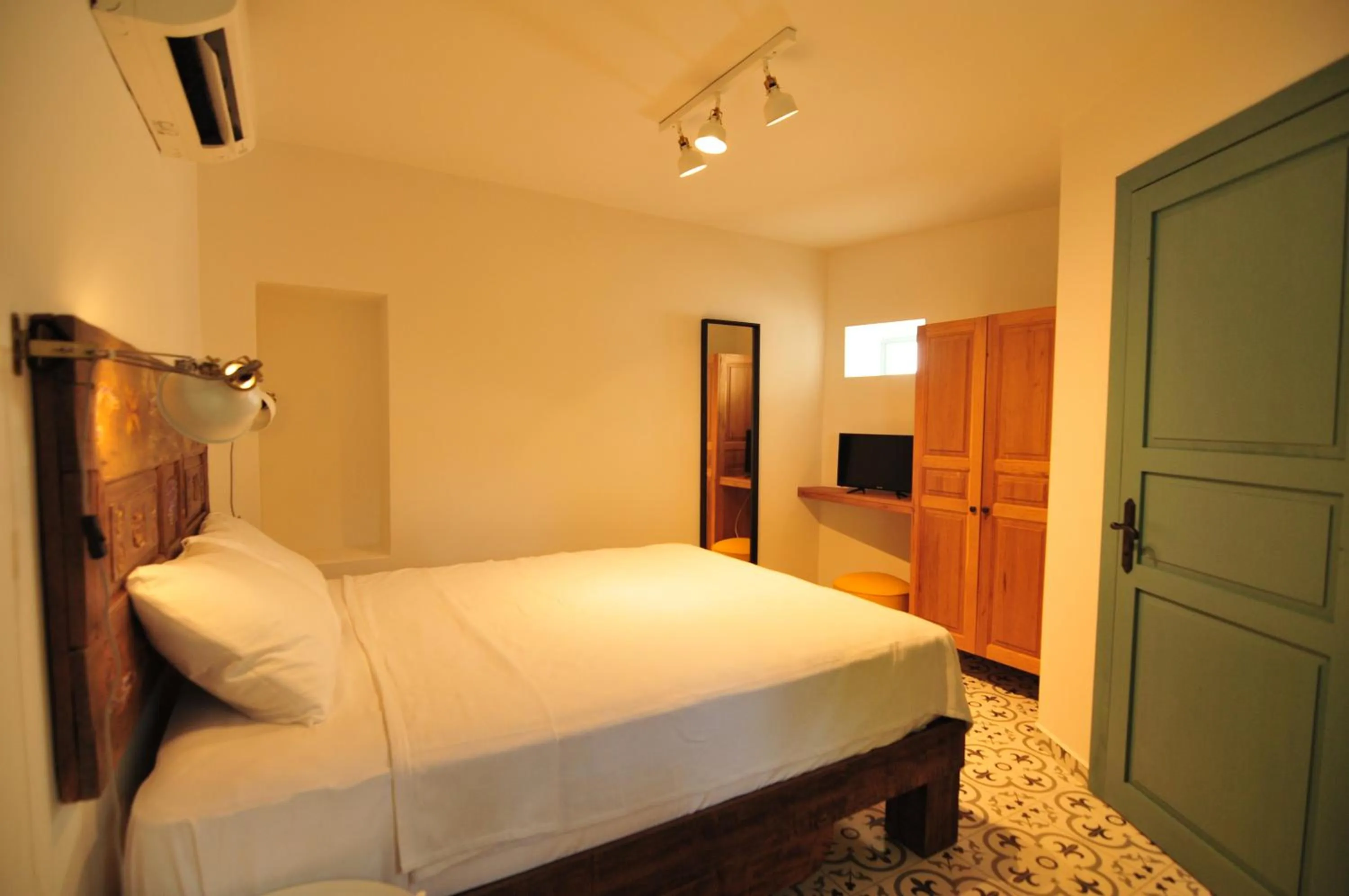 Bed in Oalis Boutique Hotel