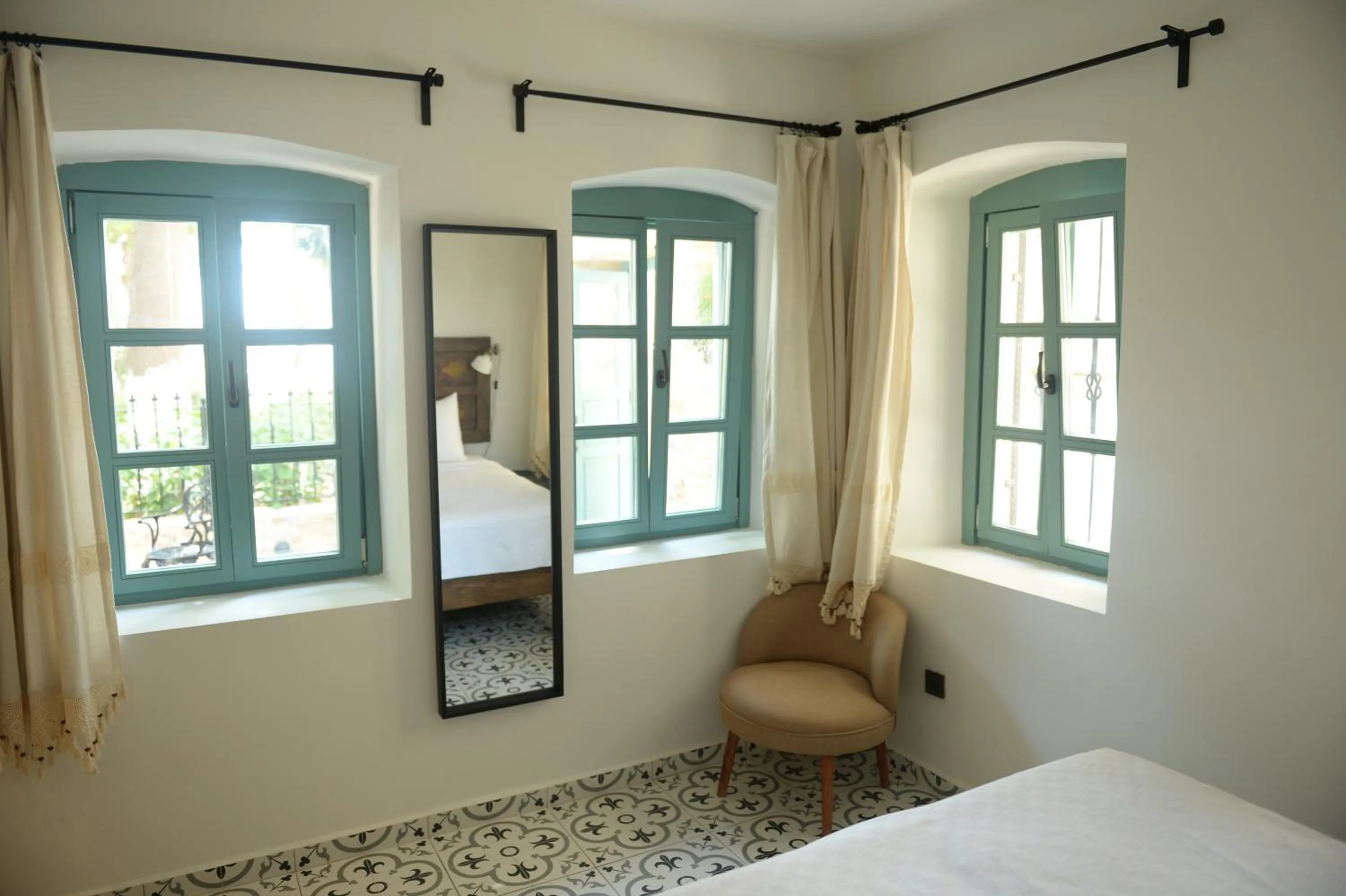 Bed in Oalis Boutique Hotel