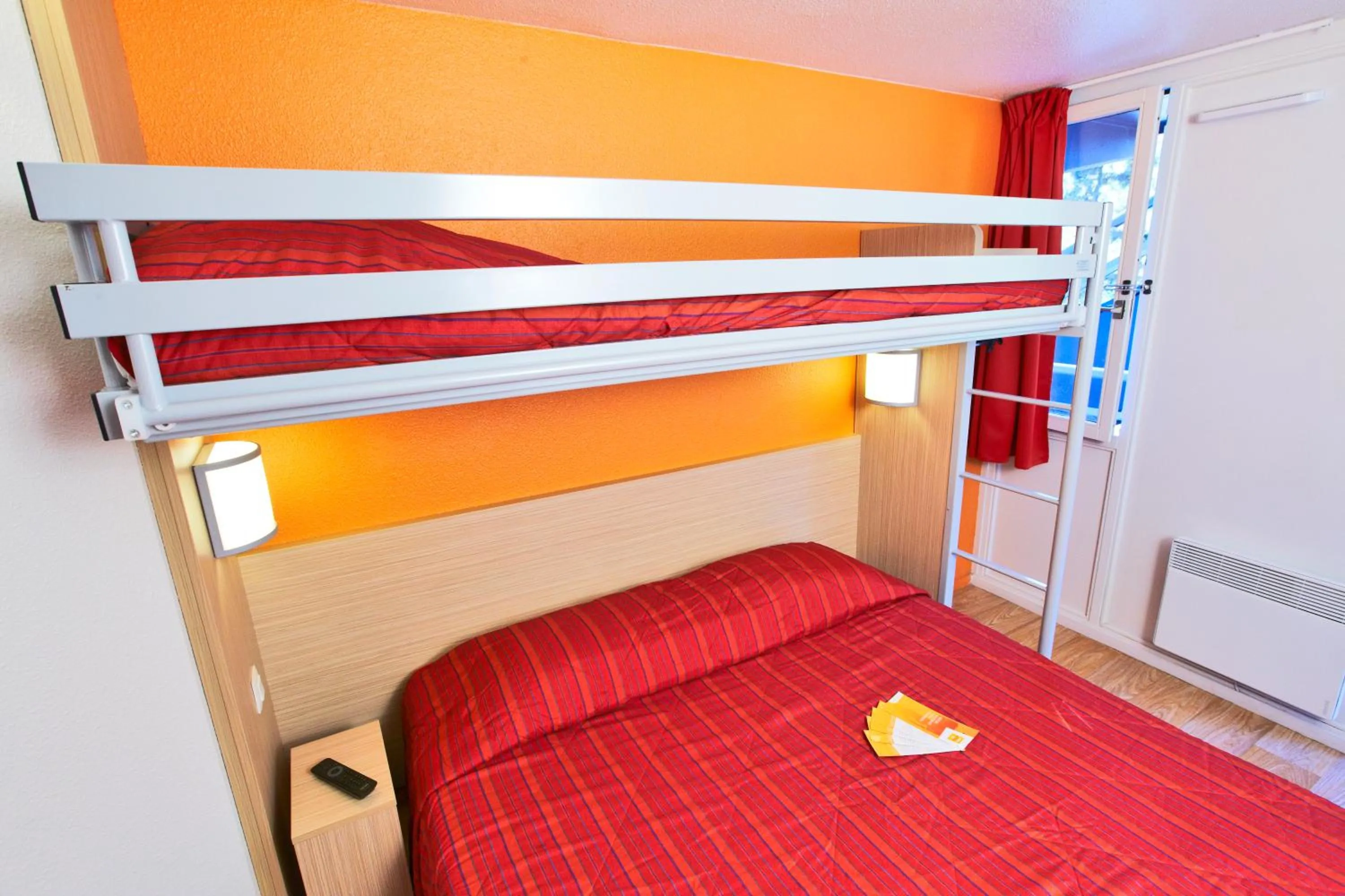 Property building, Bed in Premiere Classe Plaisir