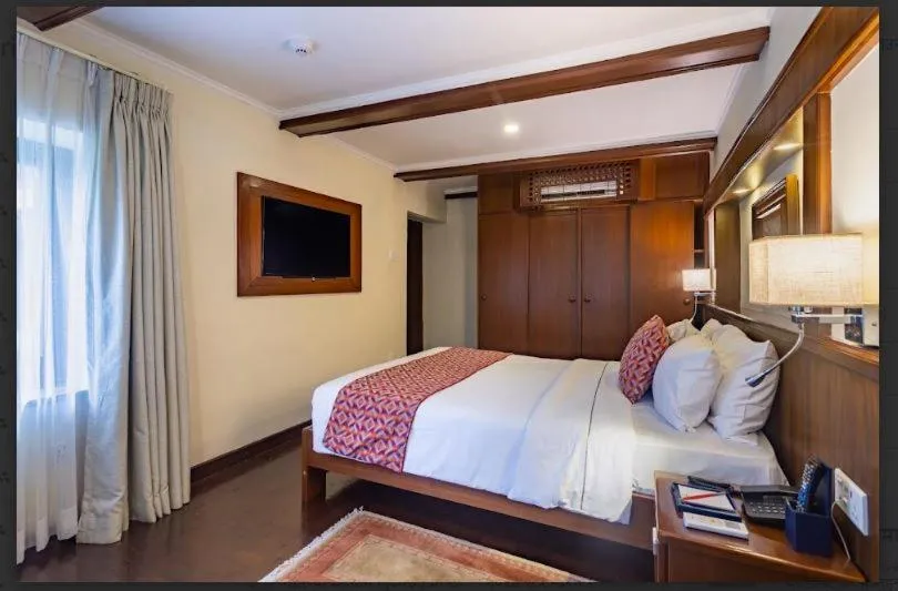 Photo of the whole room, Bed in Fish Tail Lodge