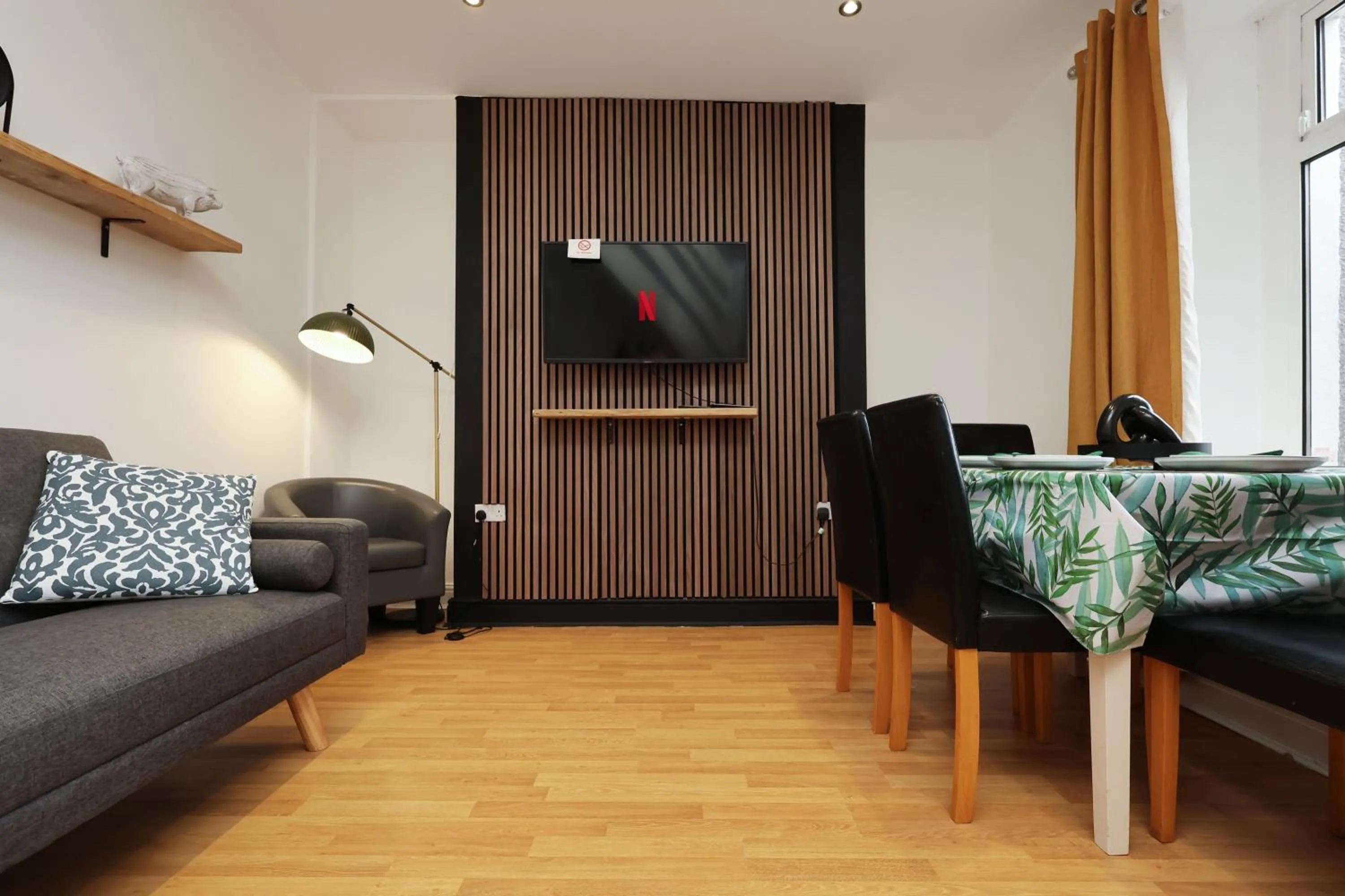 Communal lounge/ TV room in Contractor Stay - Deck - TVs in Every Room