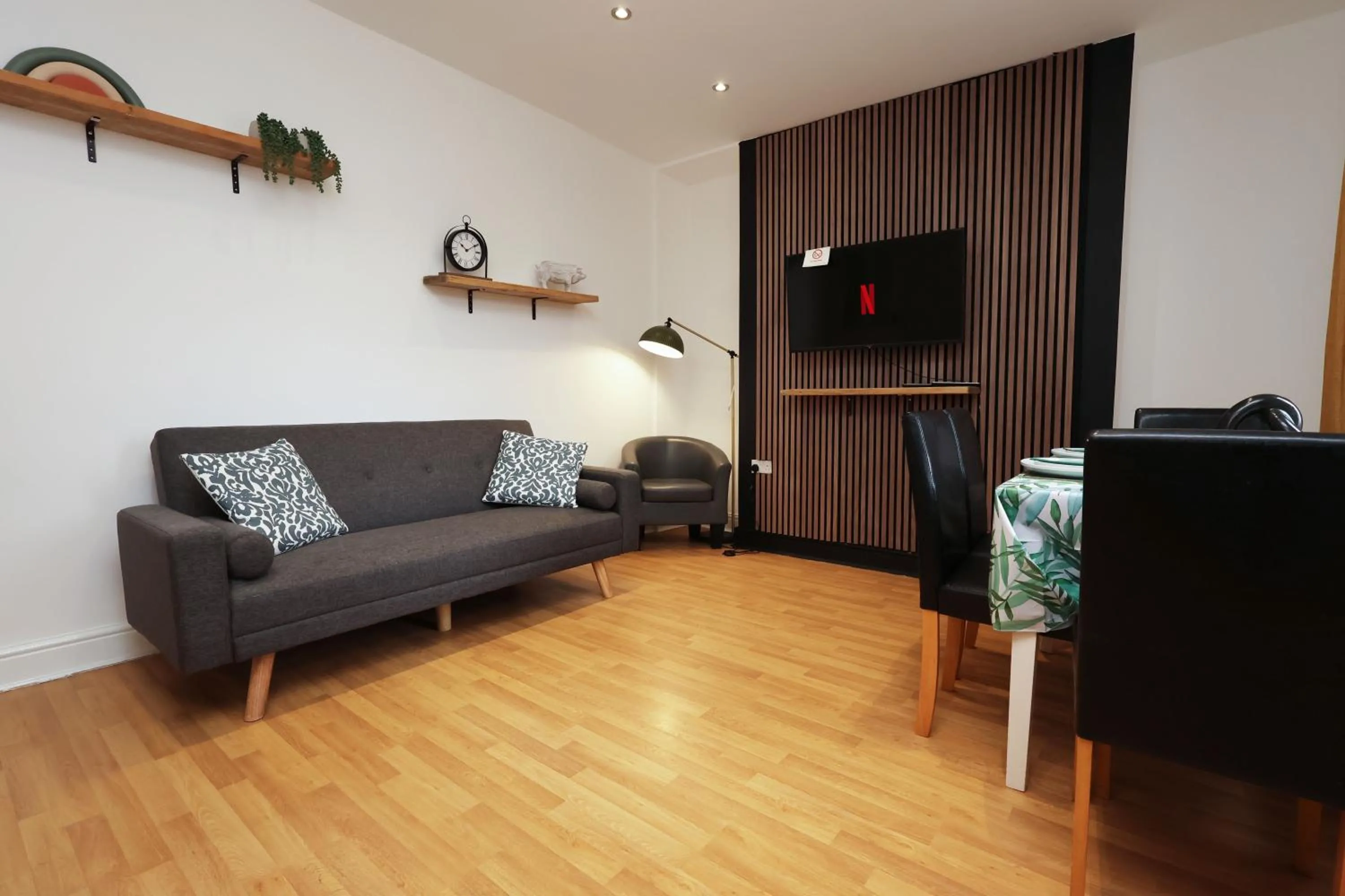 Communal lounge/ TV room in Contractor Stay - Deck - TVs in Every Room