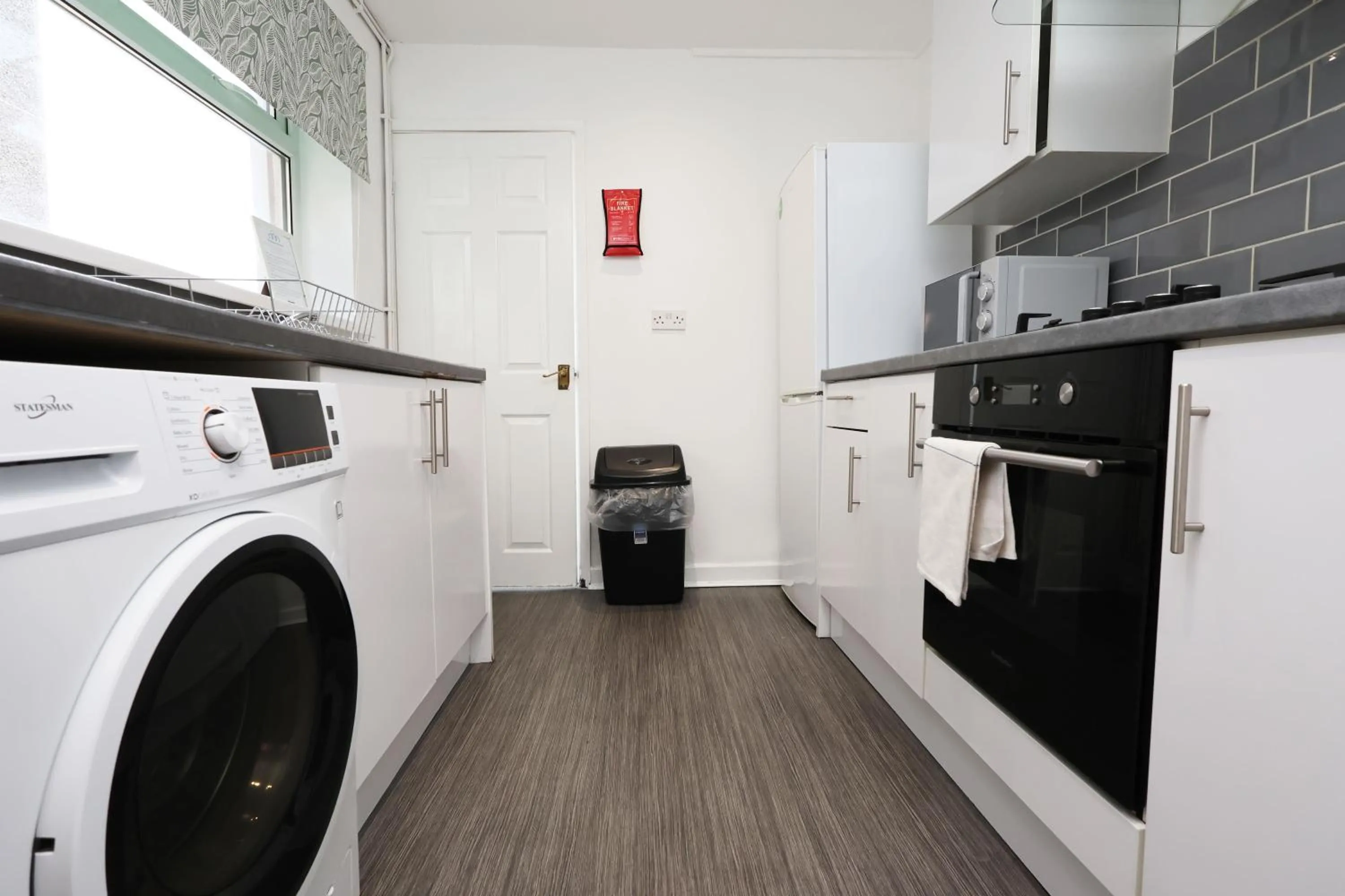 Kitchen or kitchenette in Contractor Stay - Deck - TVs in Every Room