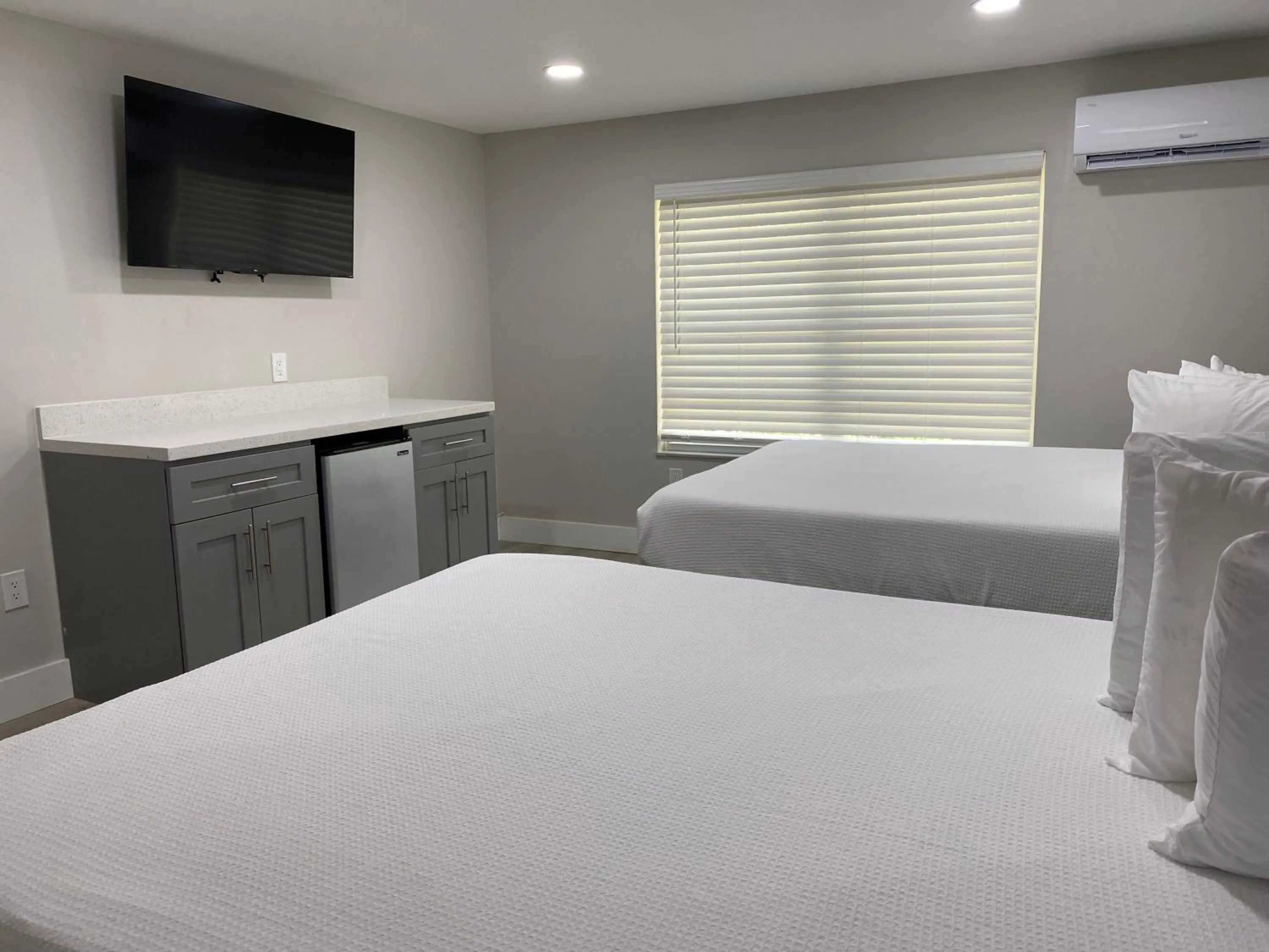 Bed in Amoray Dive Resort