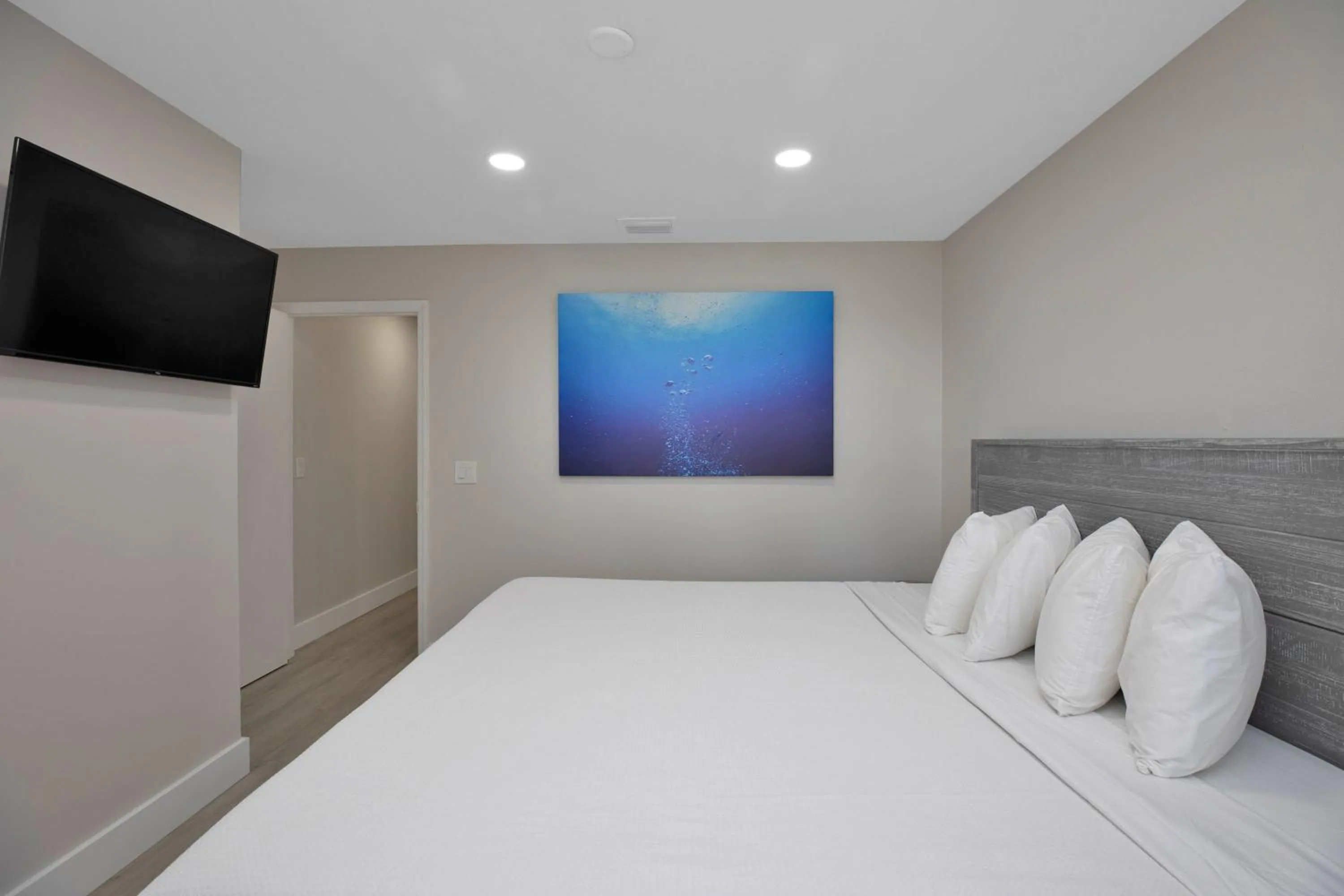 Bed in Amoray Dive Resort